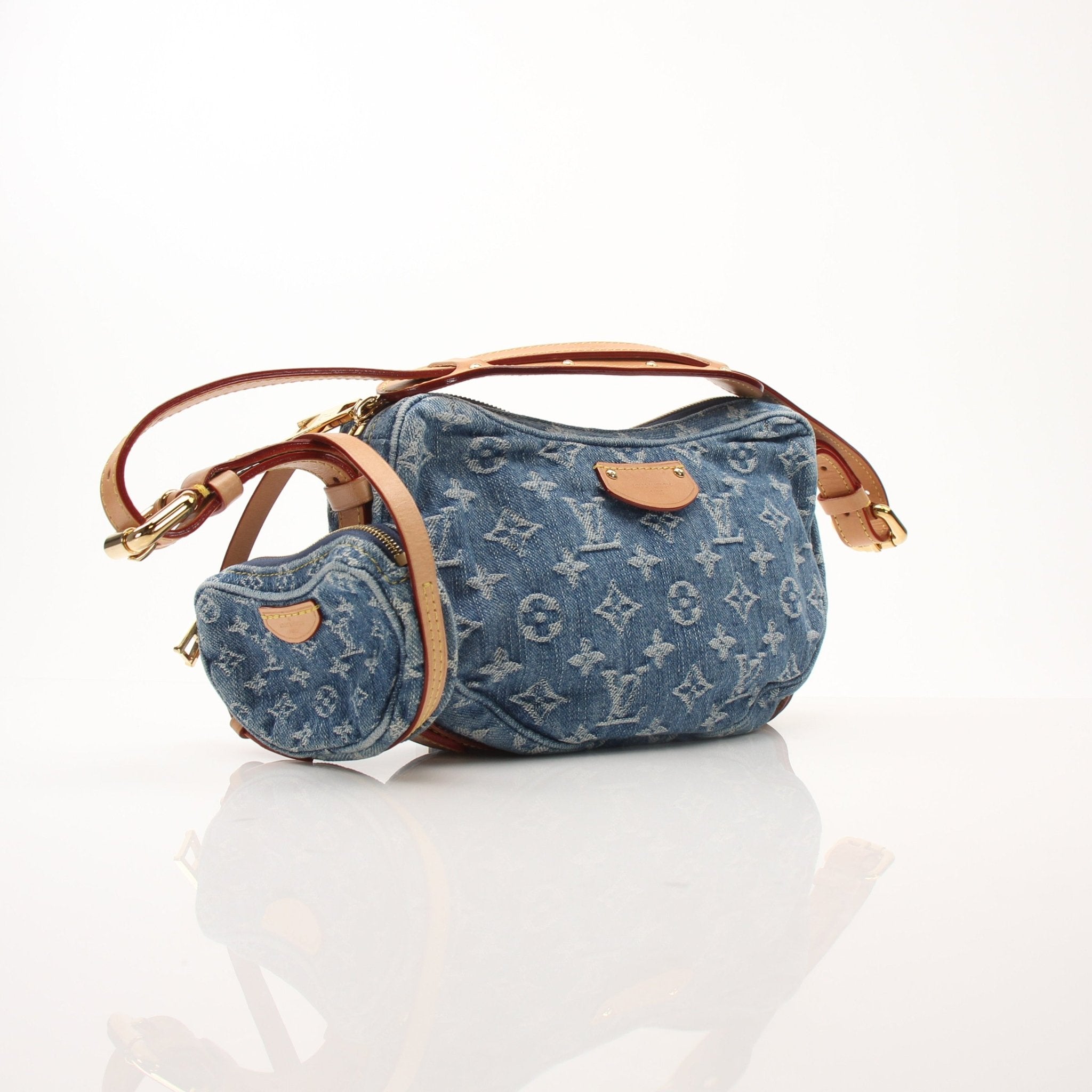 Louis Vuitton denim croissant handbag by Gold & Beyond, featuring a compact, stylish denim design with gold accents and logo details.