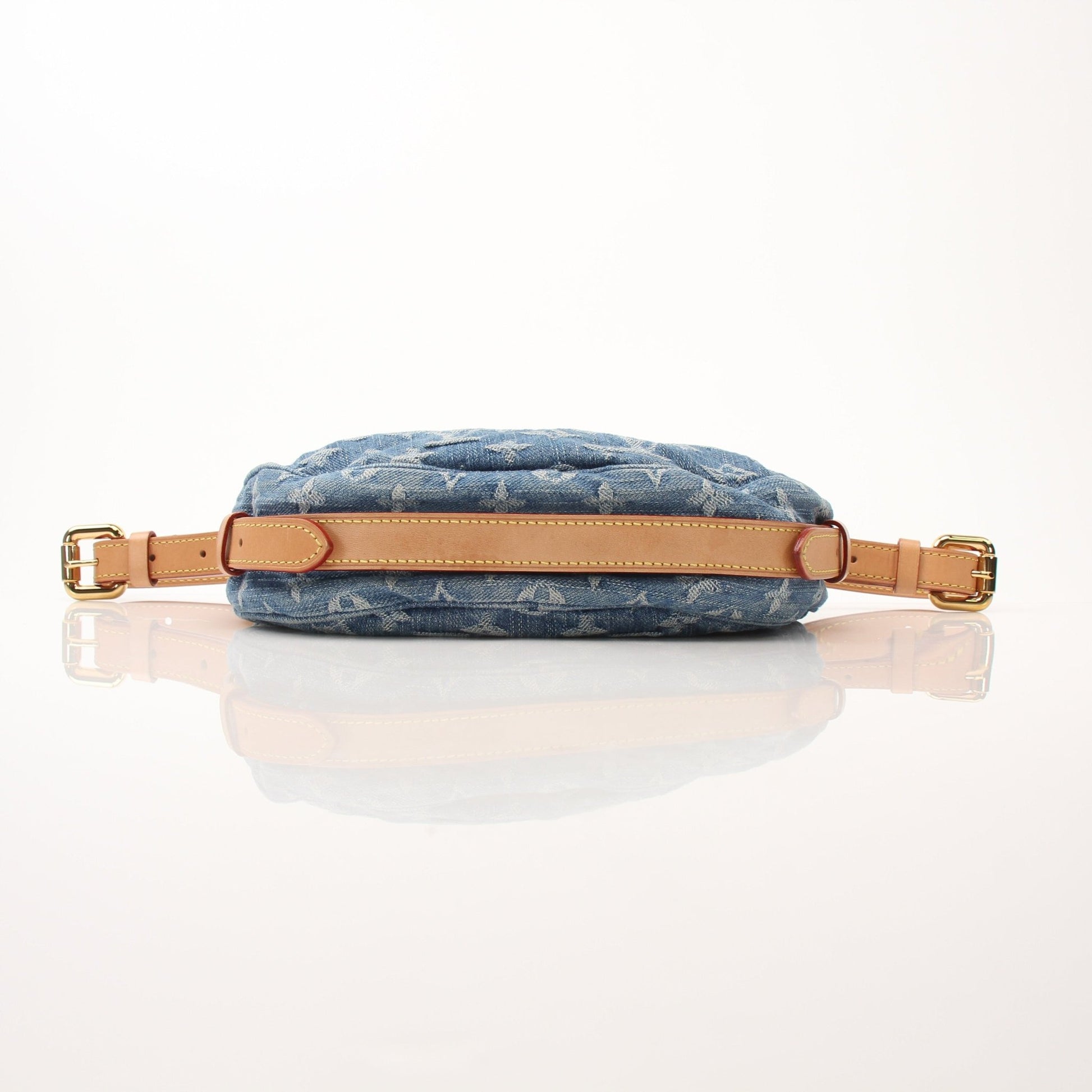 Louis Vuitton Denim Croissant handbag by Gold & Beyond, showing the stylish denim fabric and compact crescent shape.
