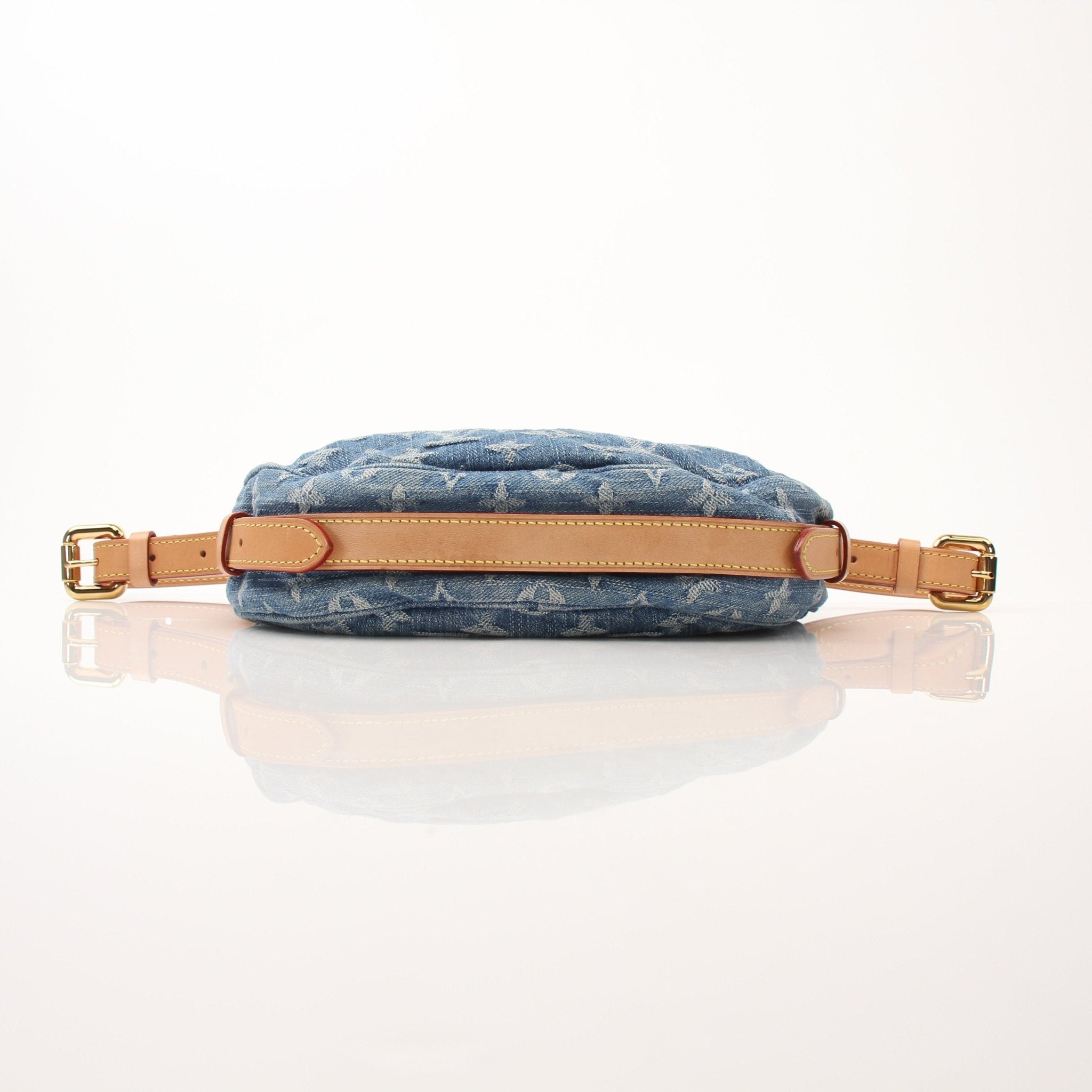 Louis Vuitton Denim Croissant handbag by Gold & Beyond, showing the stylish denim fabric and compact crescent shape.