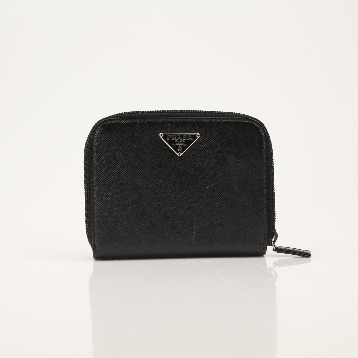 Gold & Beyond Prada zip wallet with sleek design, featuring multiple card slots and a secure zipper closure.