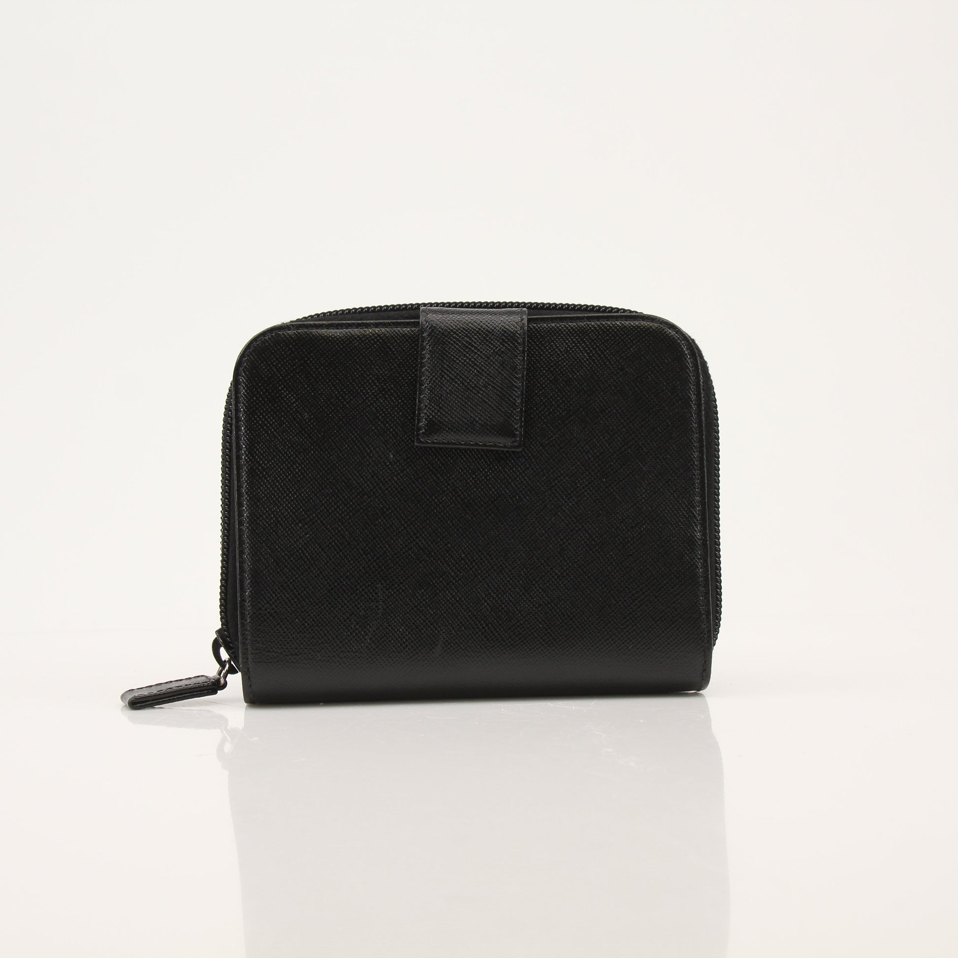 Gold & Beyond Prada zip wallet with leather exterior and metal zipper, showcasing sleek design and compact size.