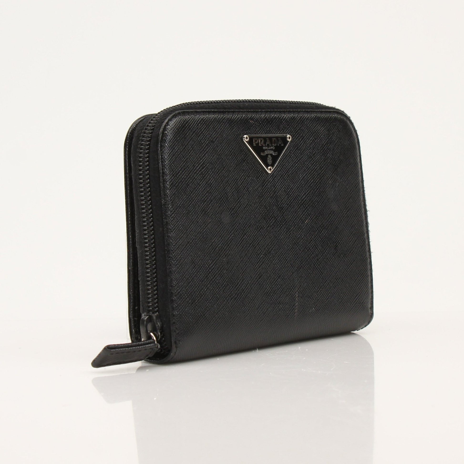 Gold & Beyond Prada zip wallet with multiple card slots and sleek design, shown in black leather.