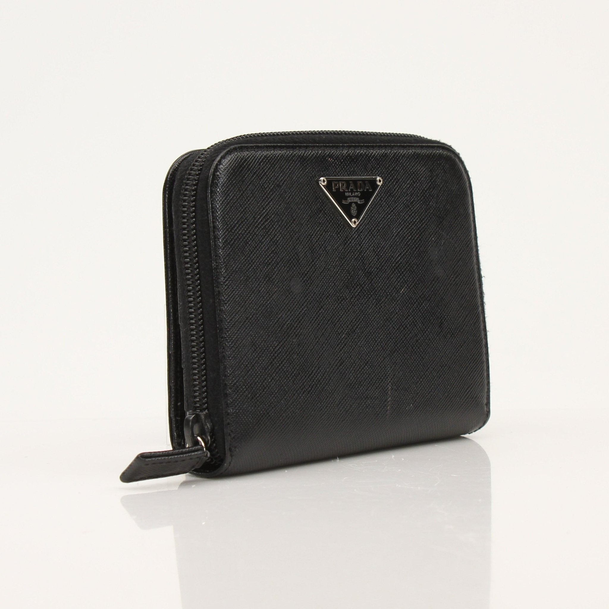 Gold & Beyond Prada zip wallet with multiple card slots and sleek design, shown in black leather.