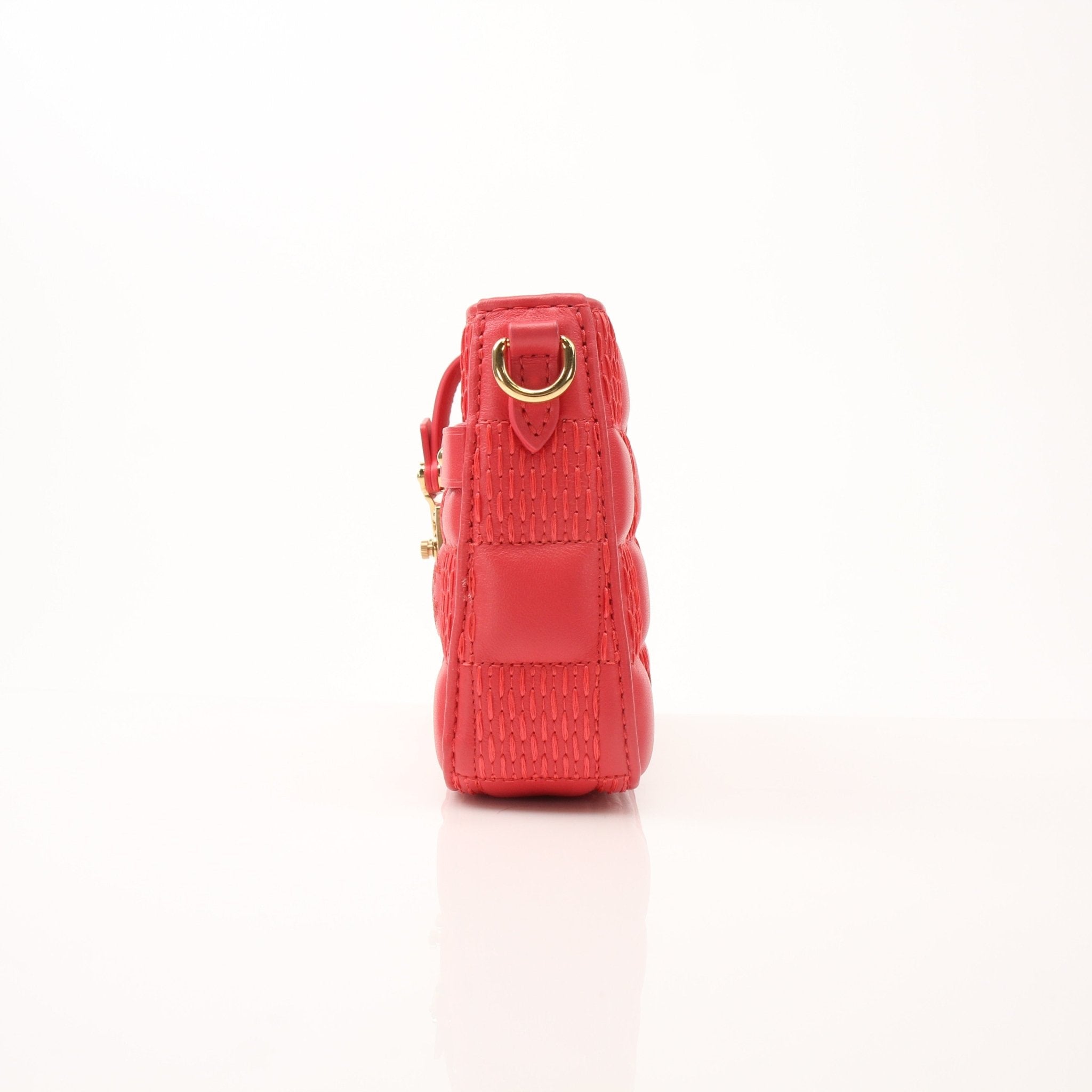 Louis Vuitton Pochette Troca PM handbag in black leather with gold hardware, showing the front view and adjustable strap.