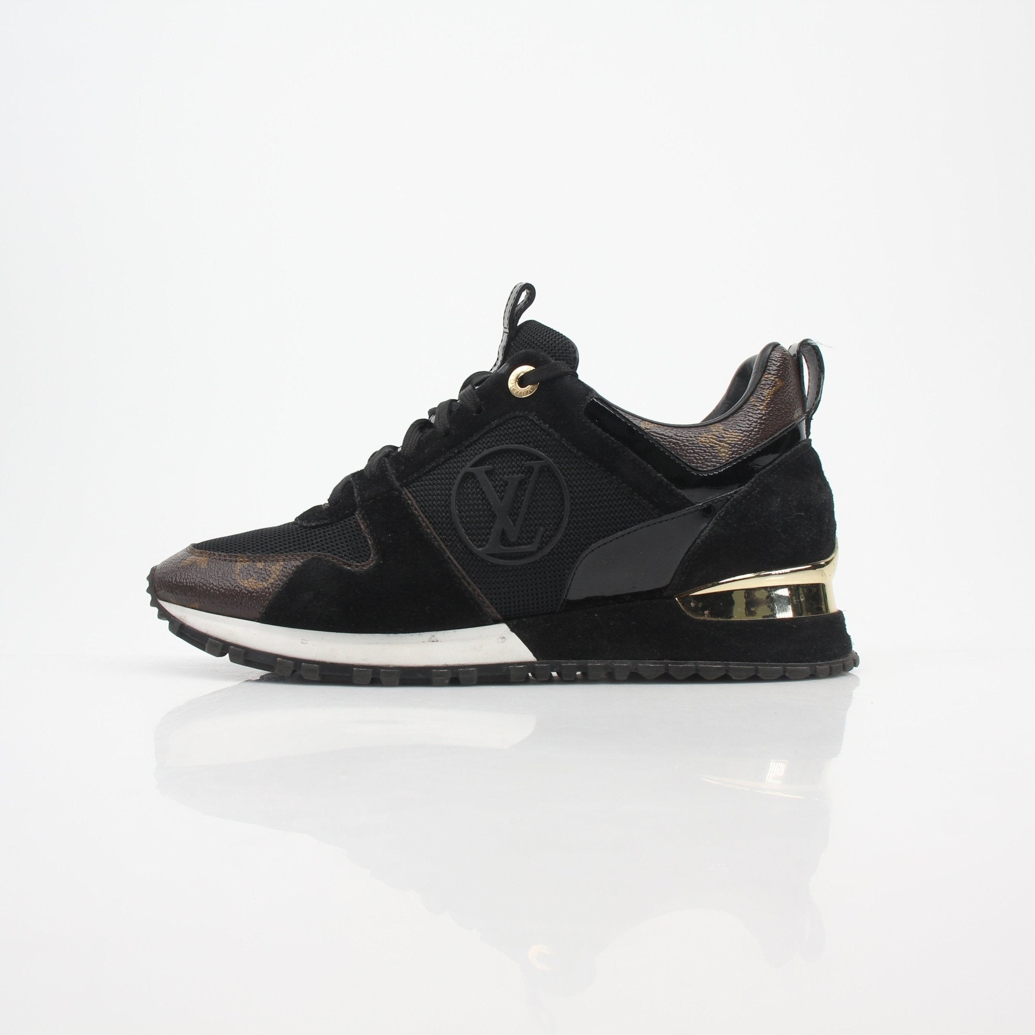 Louis Vuitton Women’s Run Away Monogram Sneakers by Gold & Beyond, featuring monogram canvas, white rubber soles, and stylish design.