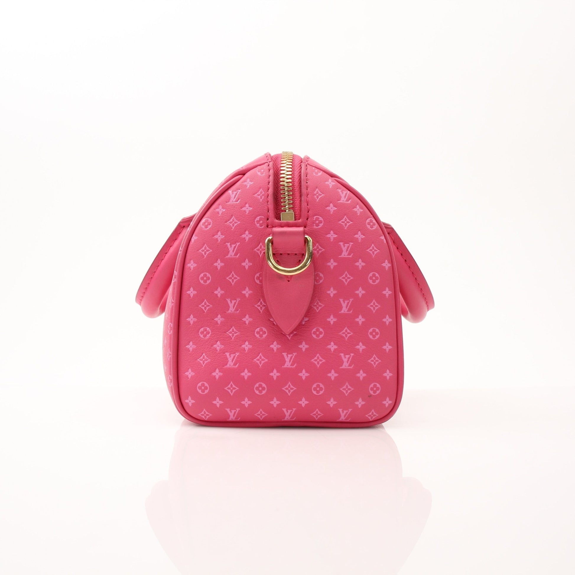 Pink Louis Vuitton Speedy 20 handbag with gold-tone accents, featuring a structured design and adjustable bandoulière strap.