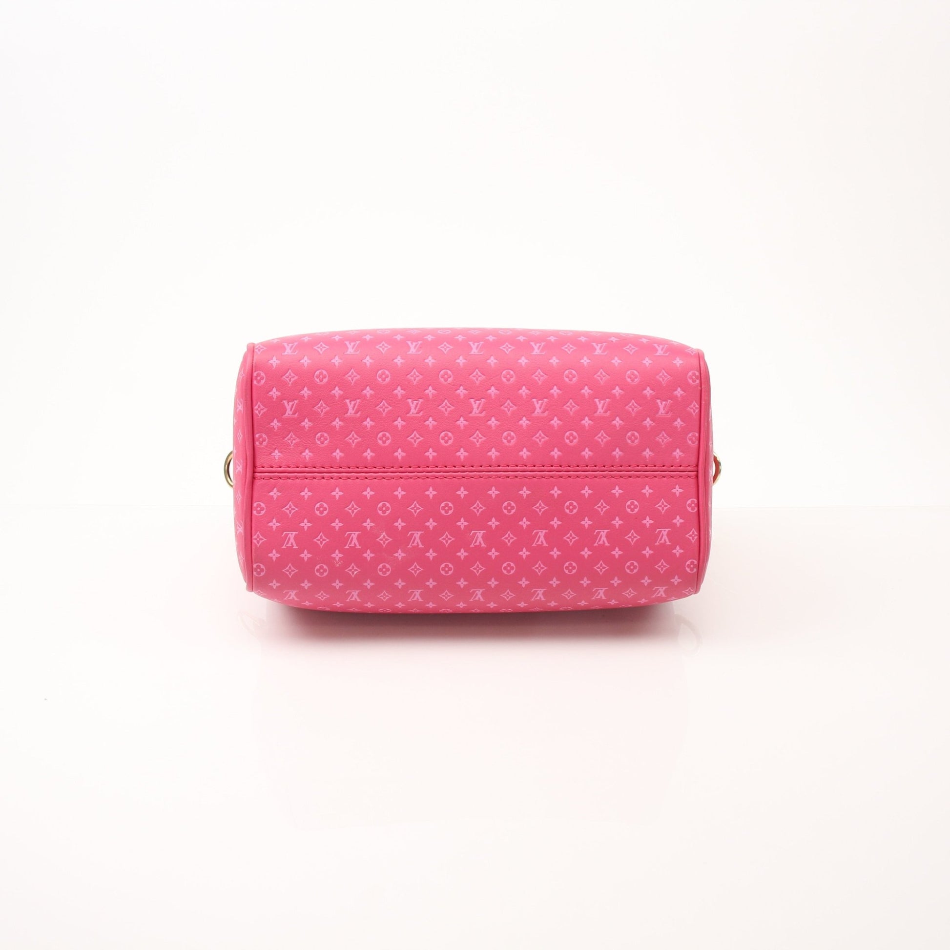 Pink Louis Vuitton Speedy 20 handbag with gold hardware and adjustable bandoulière strap, stylish and compact luxury bag.