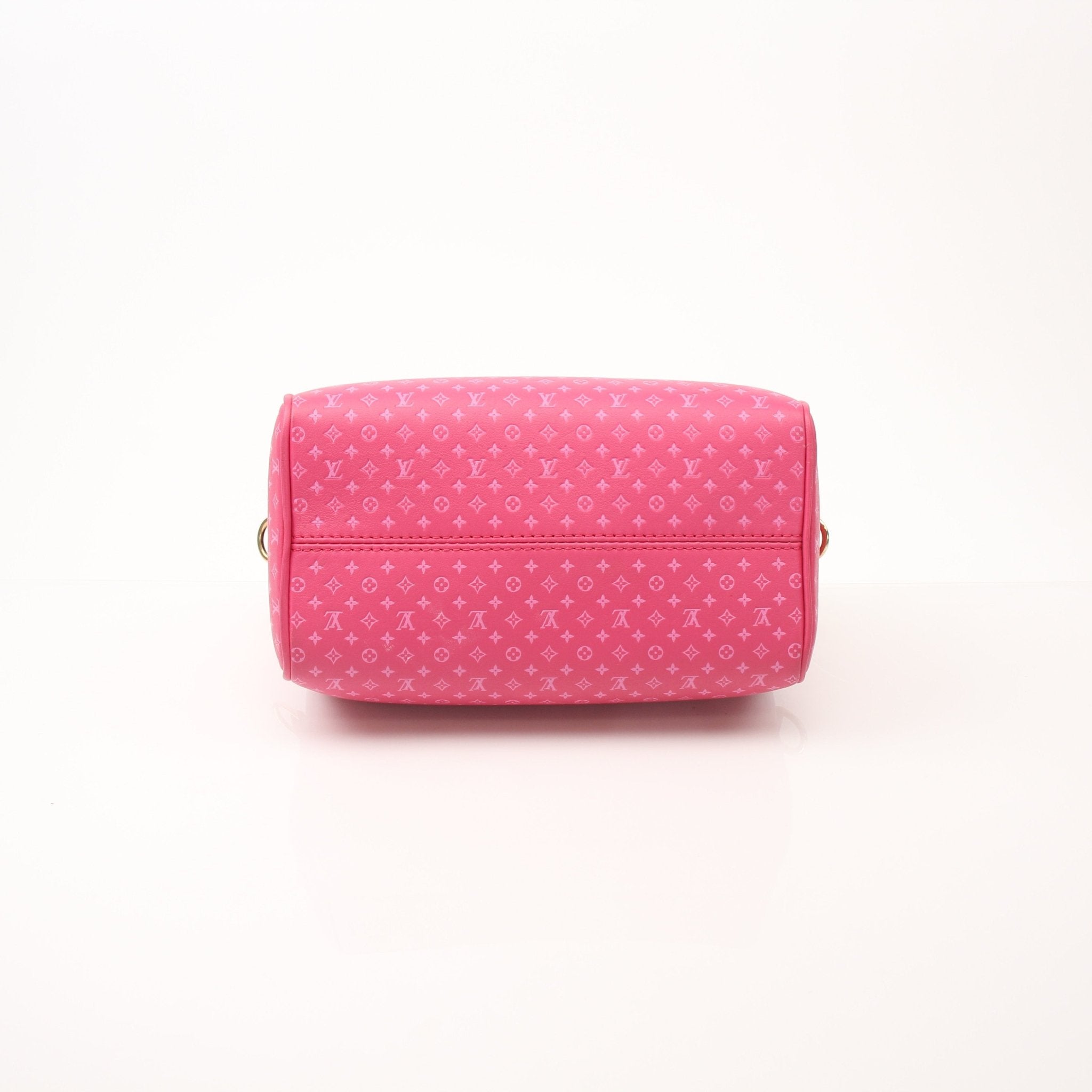Pink Louis Vuitton Speedy 20 handbag with gold hardware and adjustable bandoulière strap, stylish and compact luxury bag.