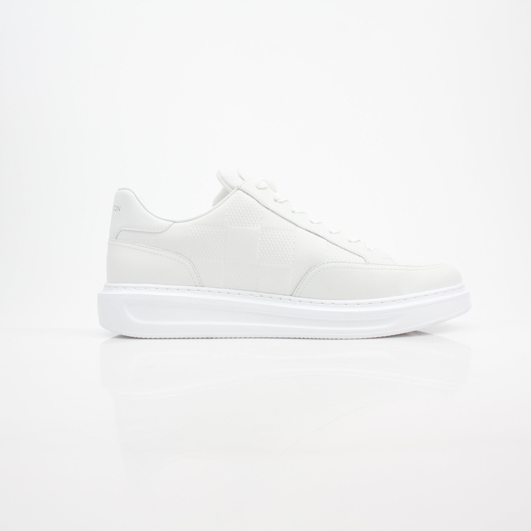 Louis Vuitton men’s Beverly Hills Damier leather sneakers with gold accents, stylish shoes by Gold & Beyond, visible close-up of the footwear
