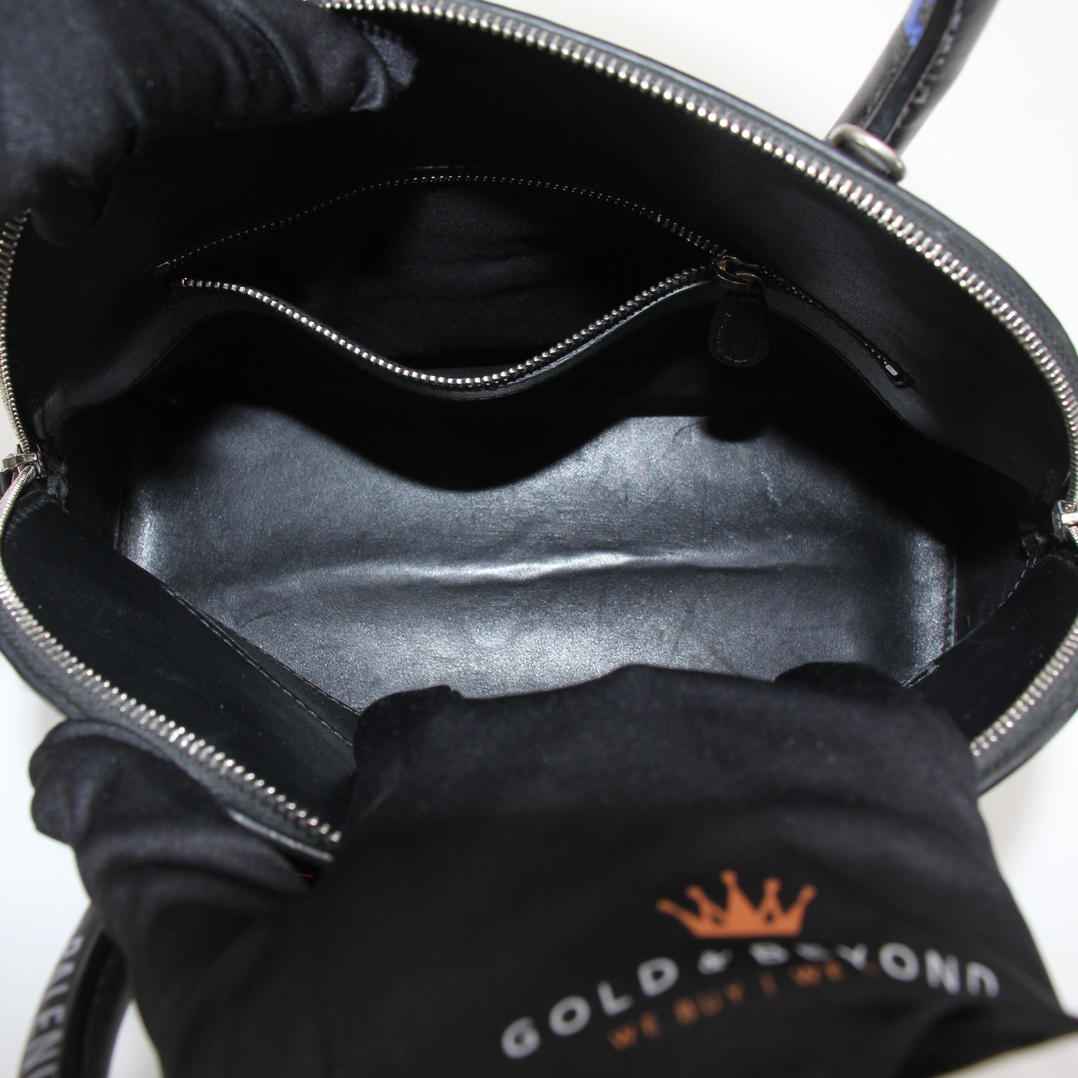 Gold & Beyond Balenciaga Ville Tote Bag, stylish handbag with leather handles and spacious interior, shown in a close-up view.