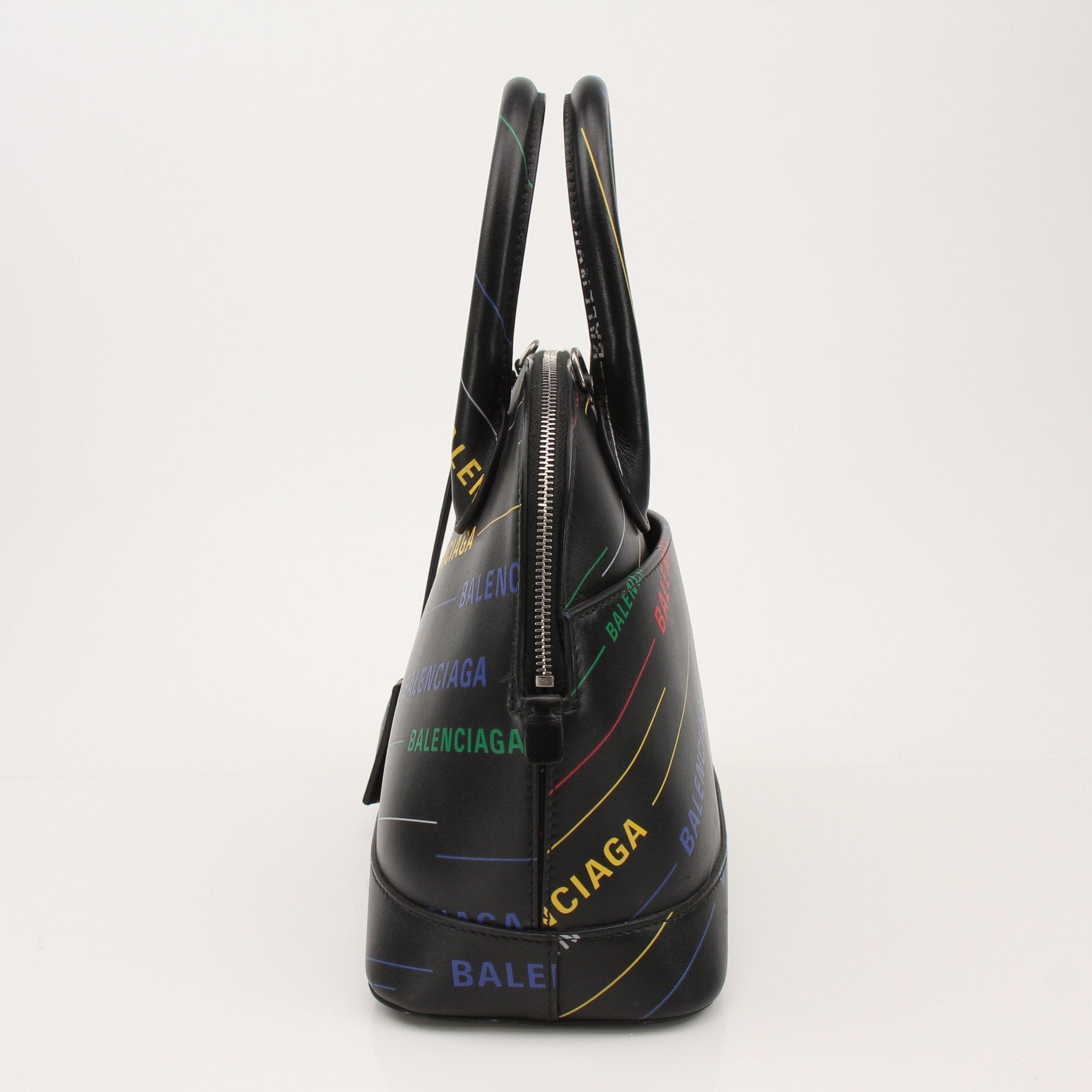 Gold & Beyond Balenciaga Ville Tote Bag, stylish handbag with structured design and top handles, shown in a sleek, modern setting.