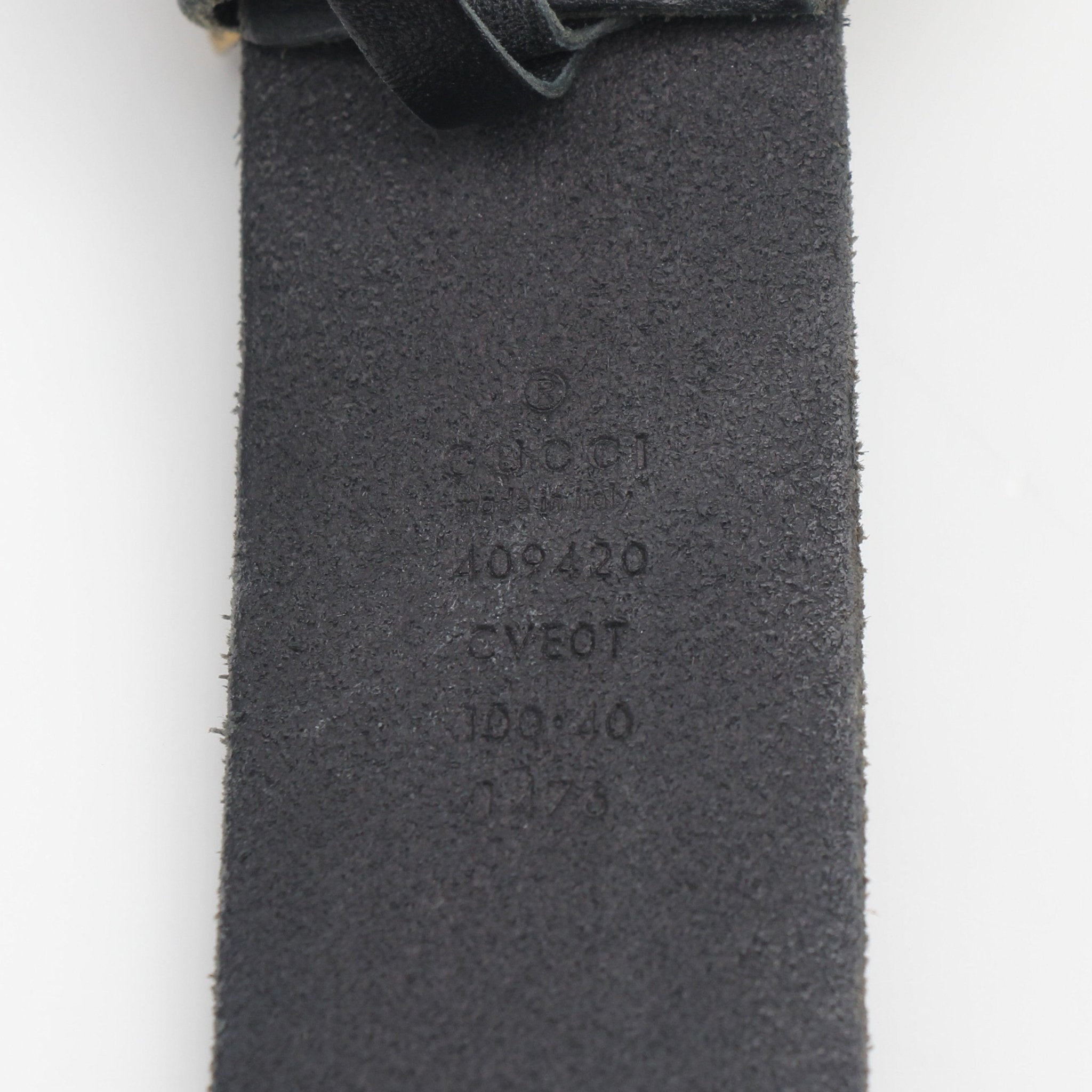 Gucci Feline Head leather belt for accessories, featuring a detailed feline head design in black leather.