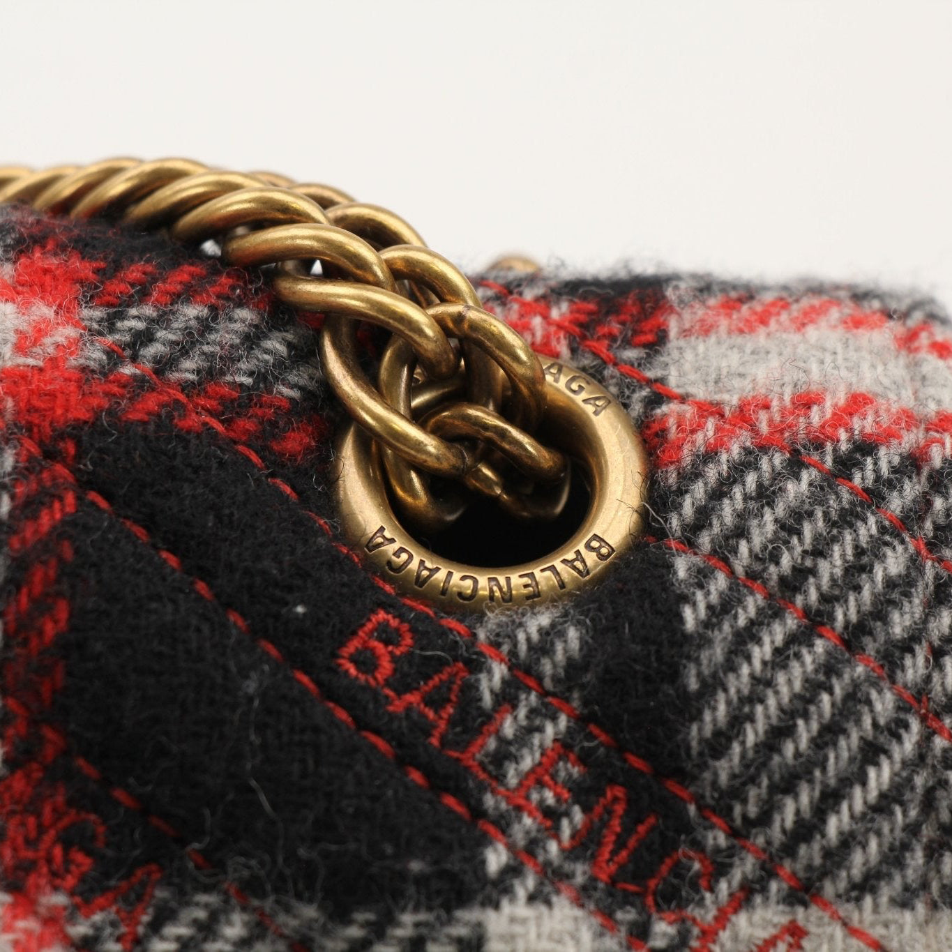 Gold & Beyond Balenciaga BB Chain Bag handbag with gold chain strap and signature logo, shown on a neutral background.