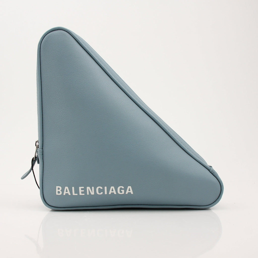 Gold & Beyond Balenciaga Triangle Pouch handbag with sleek design and distinctive logo, shown on a plain background.