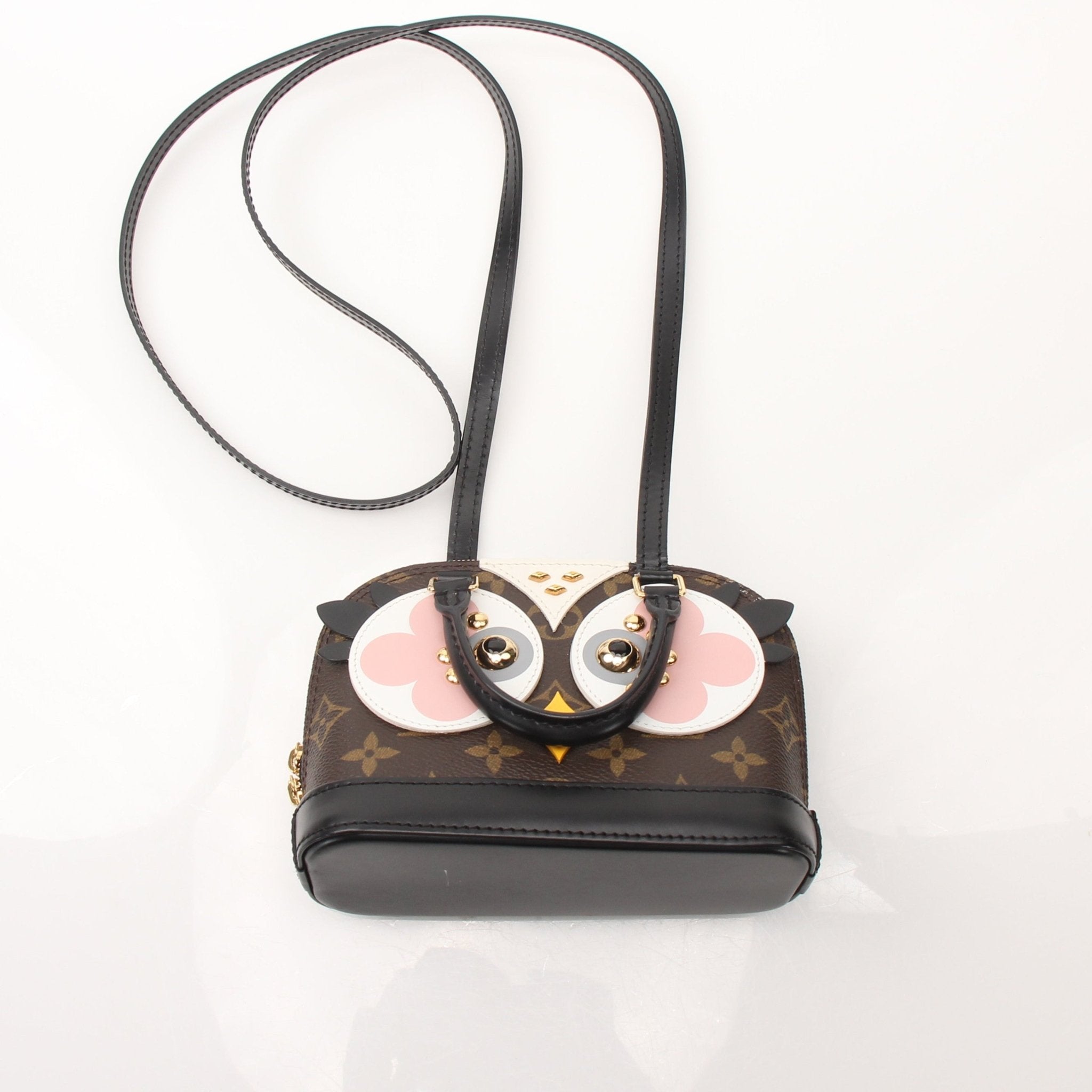 Louis Vuitton Lovely Birds Nano Alma handbag with colorful bird print, gold-tone hardware, and compact design.