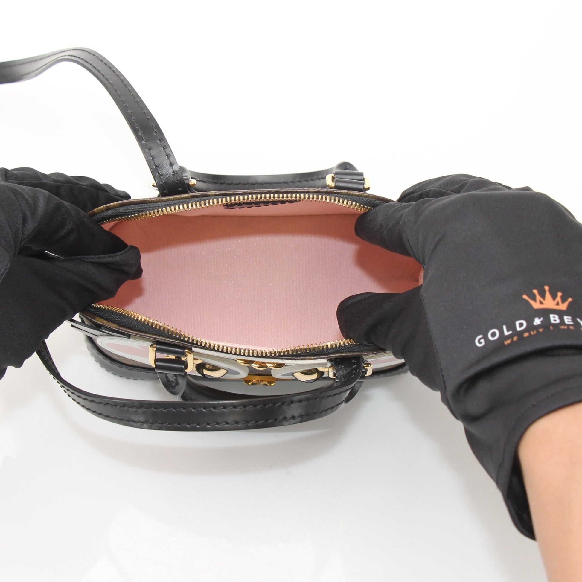 Louis Vuitton Lovely Birds Nano Alma handbag with colorful bird embroidery and gold-tone hardware on beige leather.