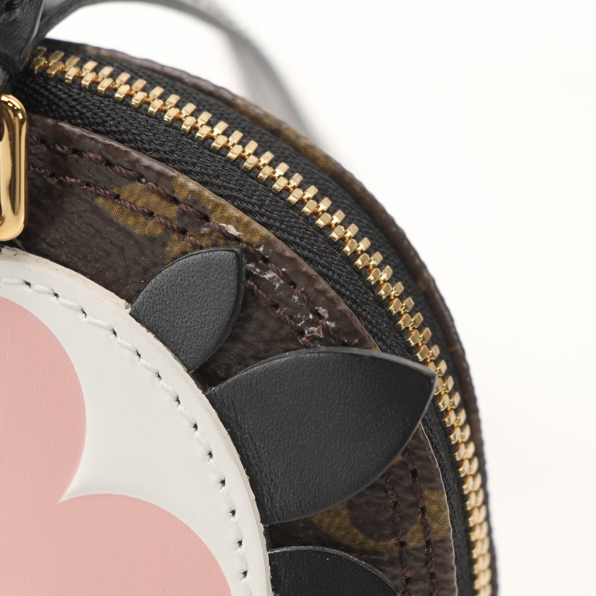Gold & Beyond Louis Vuitton Lovely Birds Nano Alma Handbag with detailed bird design and gold hardware, compact and stylish.