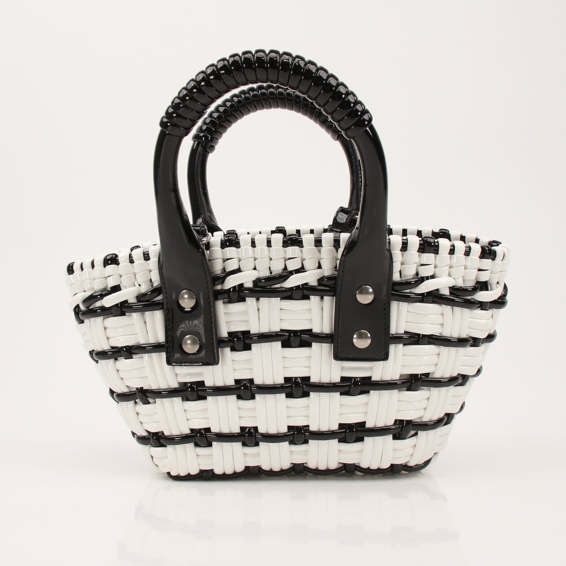 Balenciaga Bistro Basket handbag with woven design, soft leather handles, and structured shape, stylish for everyday use.
