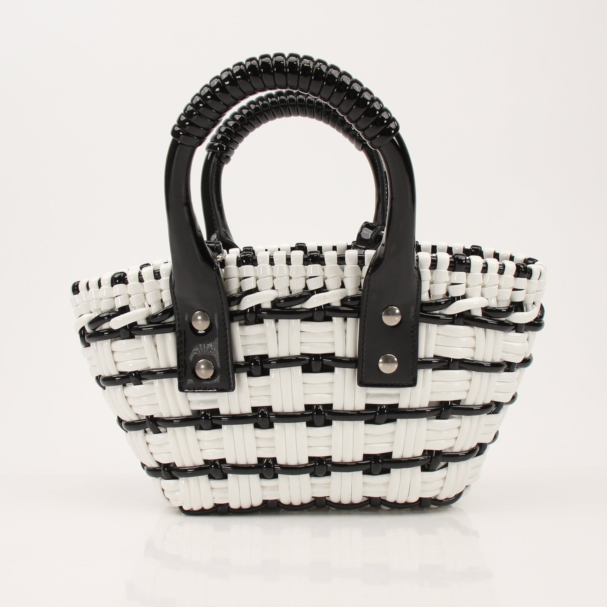Balenciaga Bistro Basket handbag with woven leather design, featuring two top handles and a structured shape.