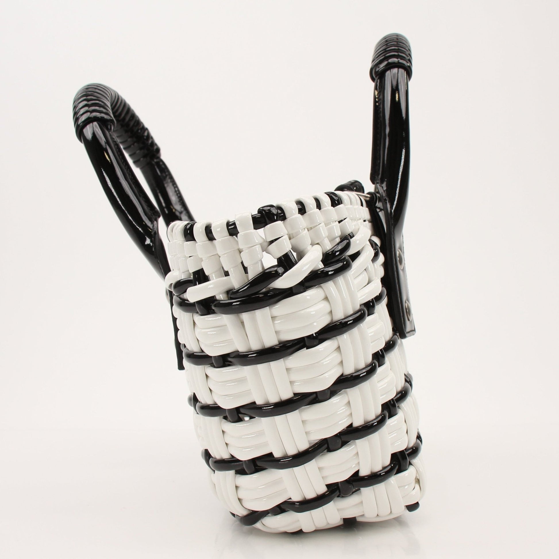 Balenciaga Bistro Basket handbag with woven design, leather handles, and structured shape displayed in the image.