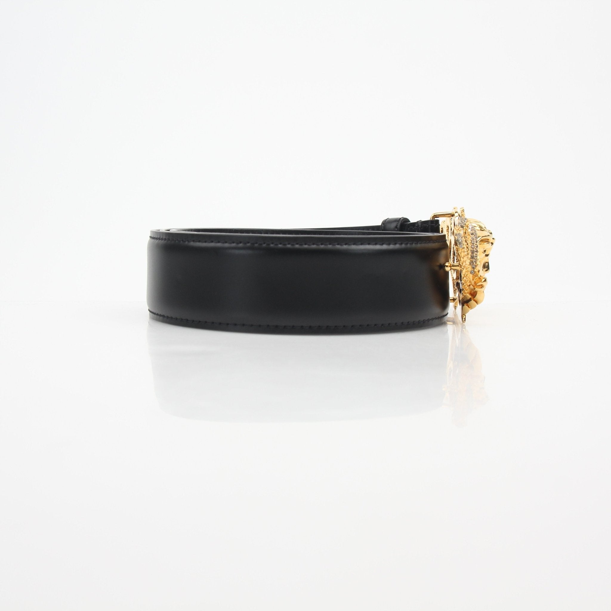 Versace Medusa snake leather belt with gold buckle, featuring a distinctive snake design, in black and gold tones.