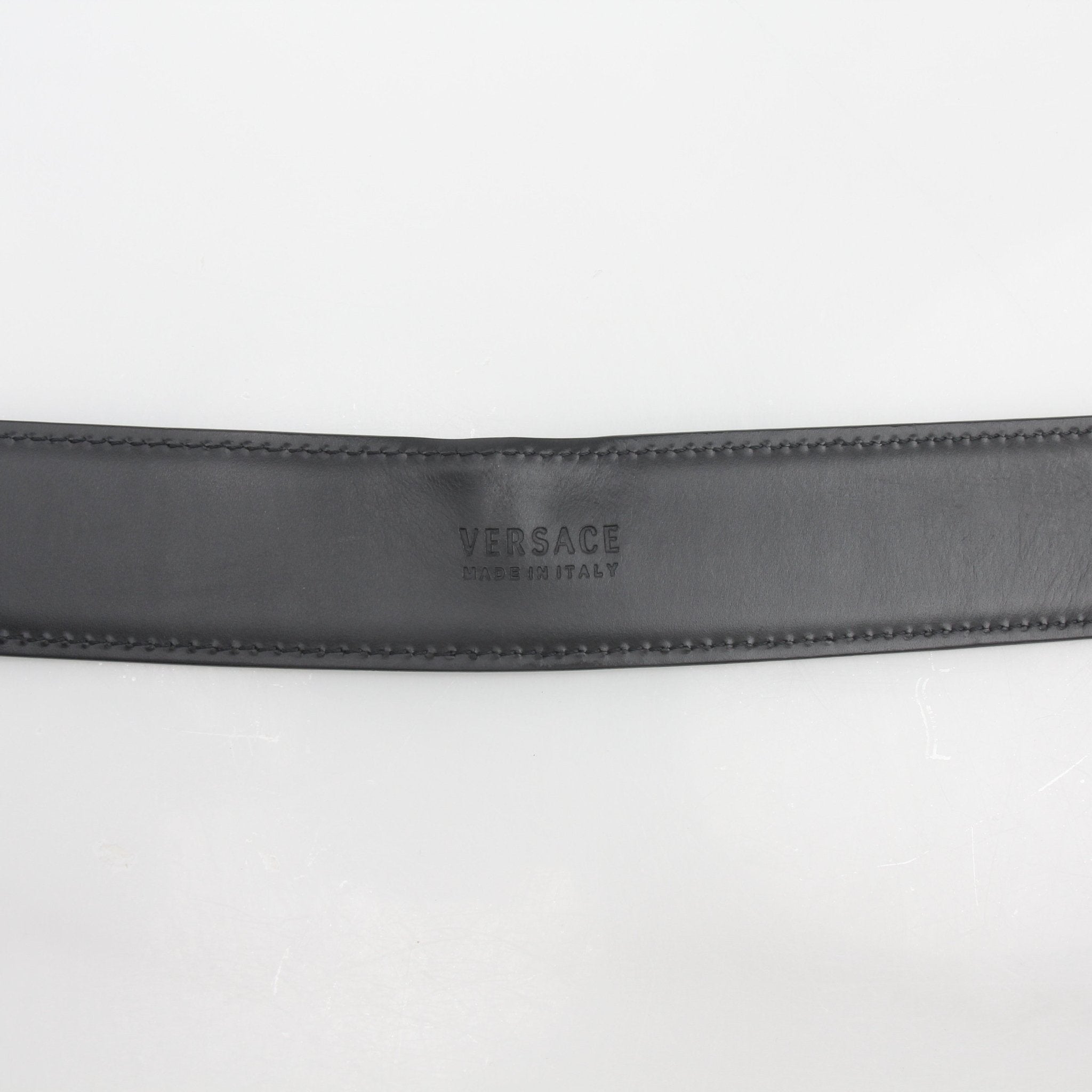 Versace Medusa snake leather belt from Gold & Beyond, featuring a detailed snake design and Medusa head buckle.