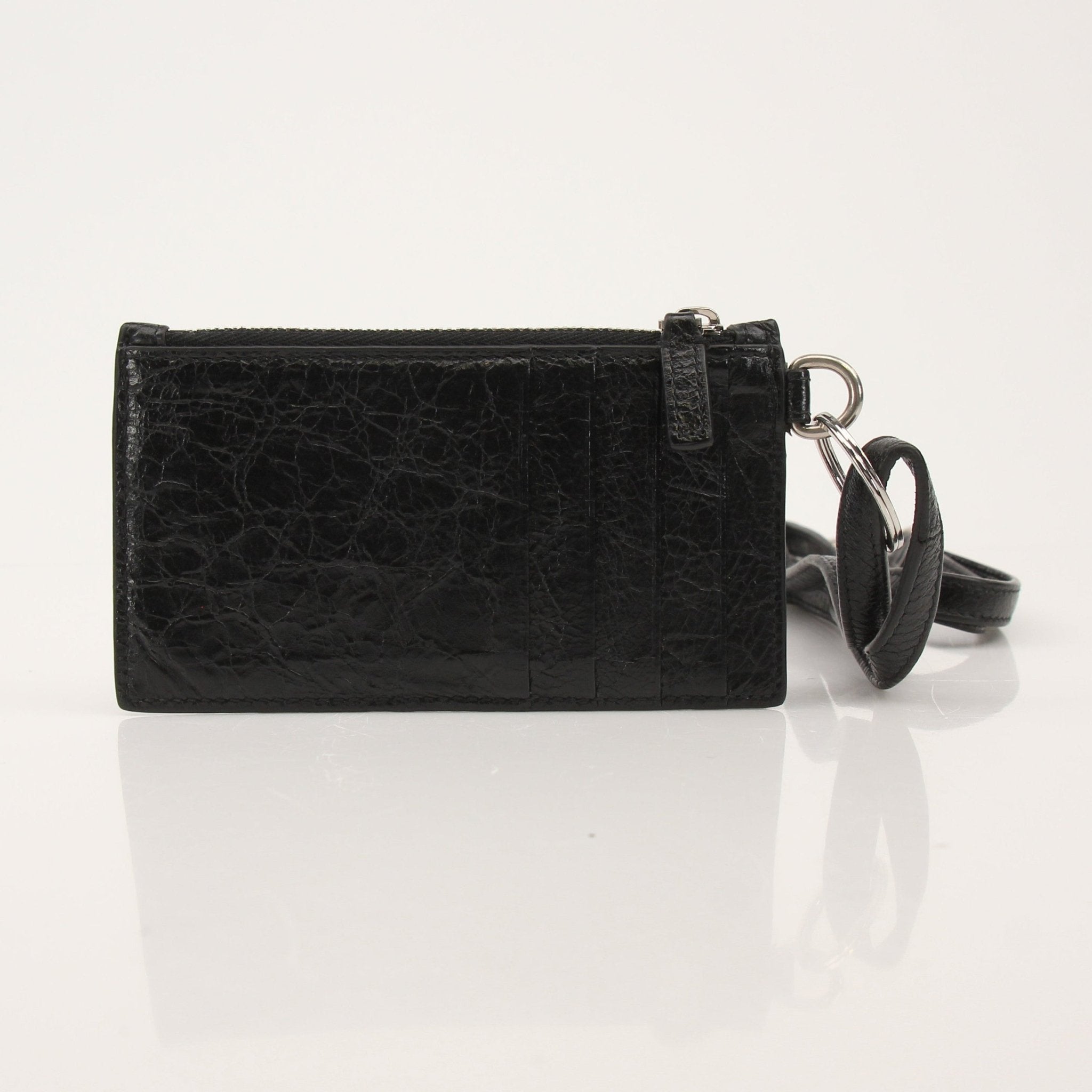 Gold & Beyond Balenciaga leather cardholder with strap, compact wallet with multiple card slots and strap attachment.