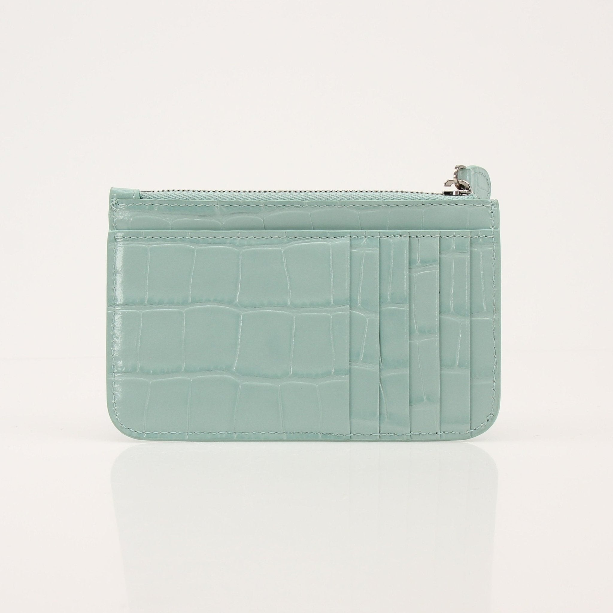 Gold & Beyond Balenciaga card holder wallet showing sleek leather design with multiple card slots and compact size.
