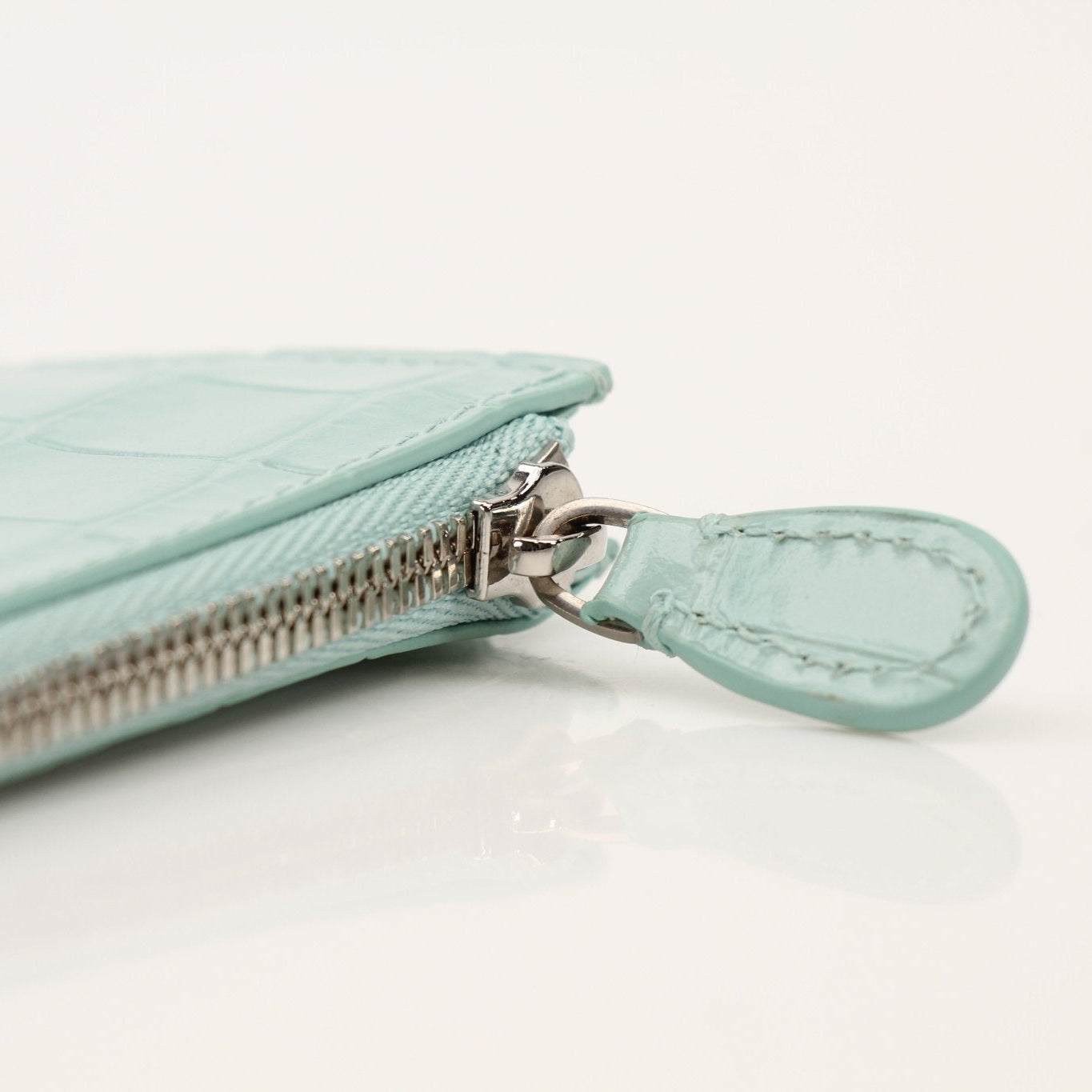 Gold & Beyond Balenciaga card holder wallet with sleek design and multiple card slots, compact and stylish accessory.