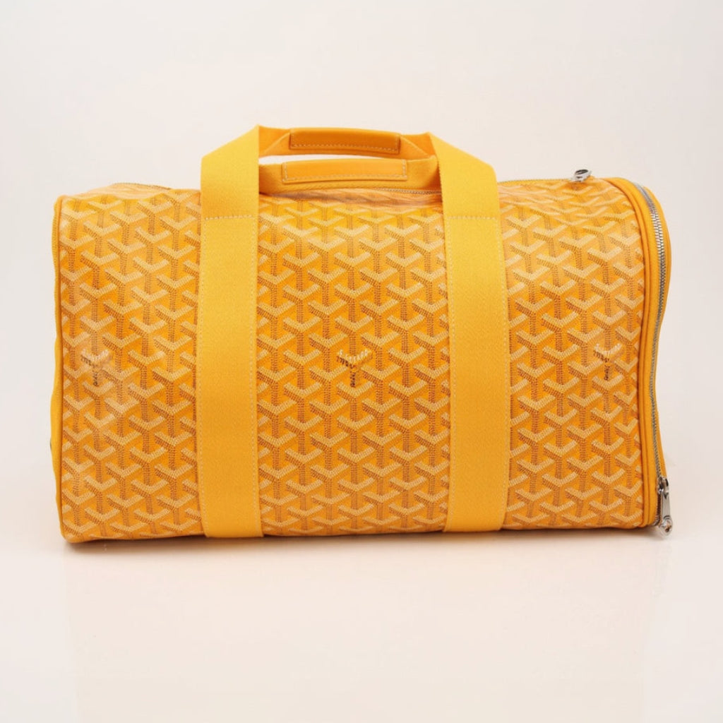 Goyard Voltiguer dog carrier travel bag by Gold & Beyond, featuring durable fabric, handles, and a spacious interior for pets