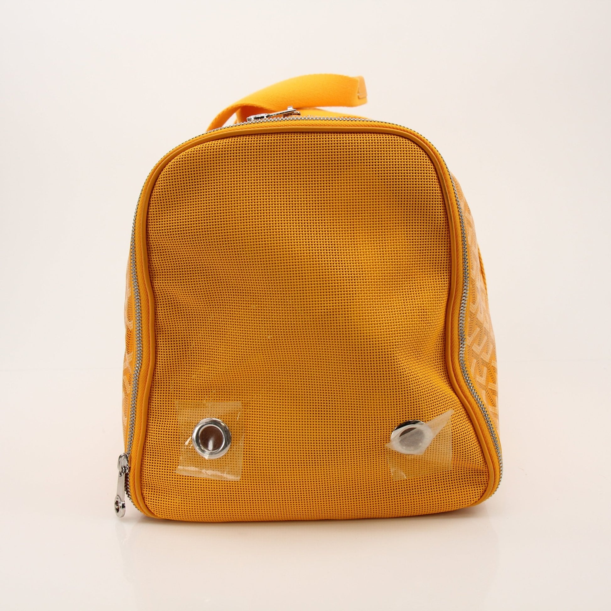 Goyard Voltiguer dog carrier travel bag by Gold & Beyond, featuring a stylish design with handles and secure interior for pet comfort.