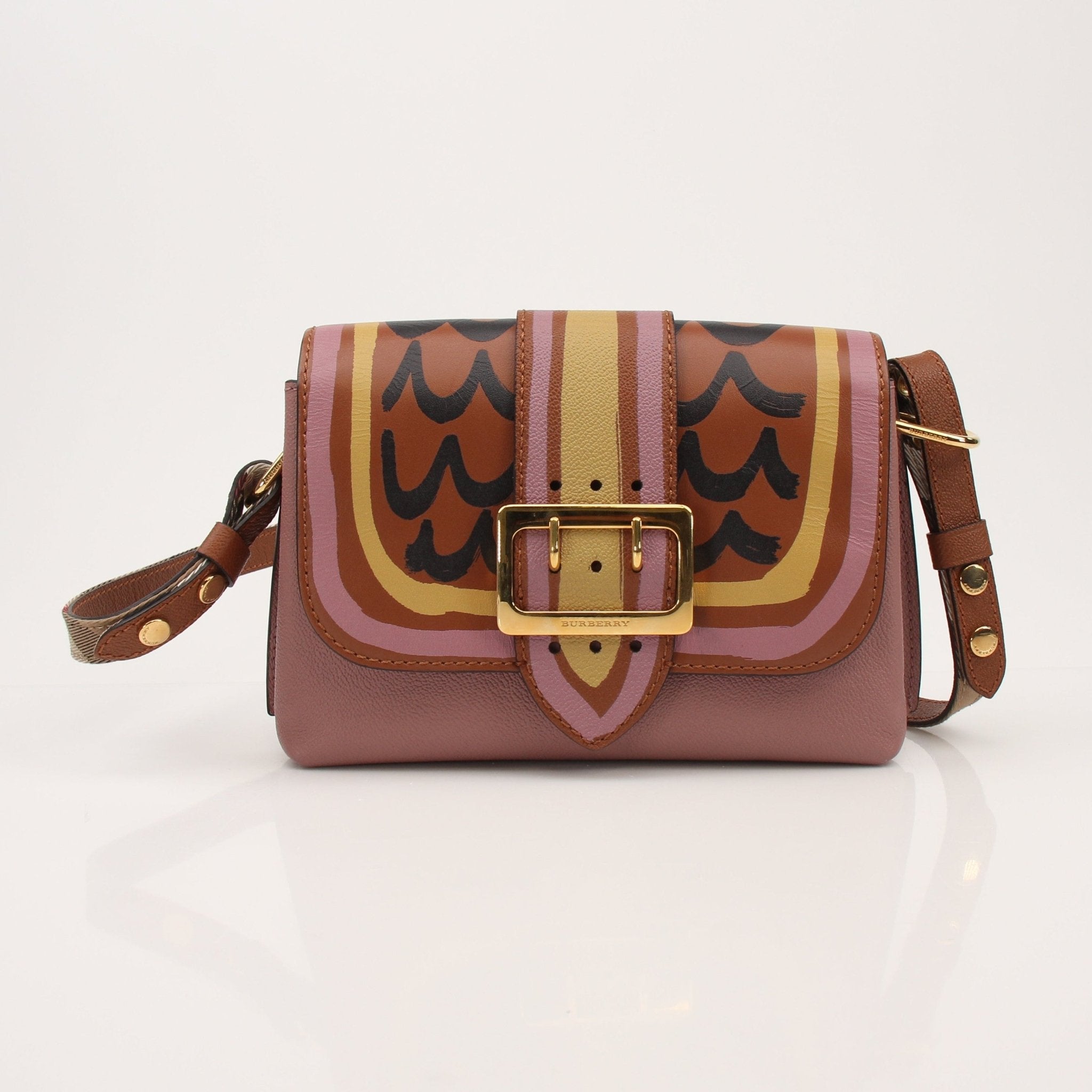 Gold & Beyond Burberry buckle crossbody handbag with adjustable strap and classic plaid design.