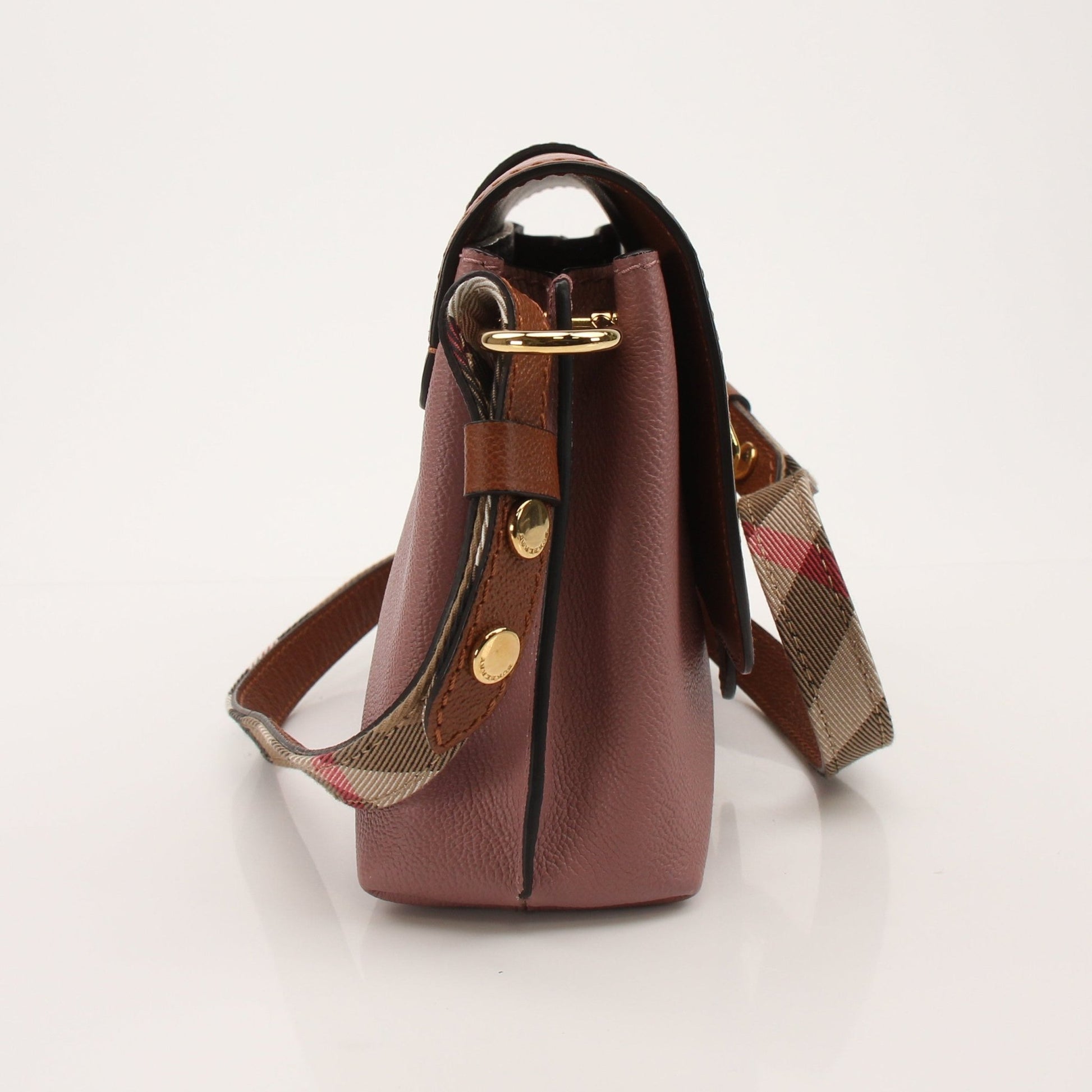 Gold & Beyond Burberry Buckle Crossbody Bag handbag with adjustable strap and signature check pattern.