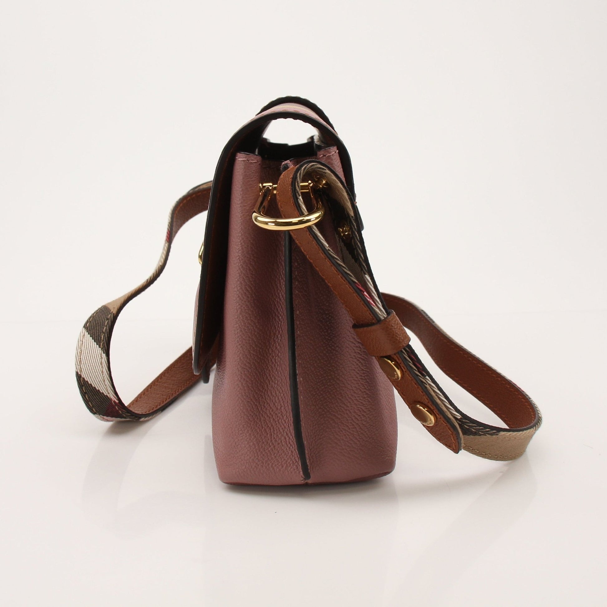 Gold & Beyond Burberry Buckle Crossbody Bag handbag with adjustable strap and signature check pattern.
