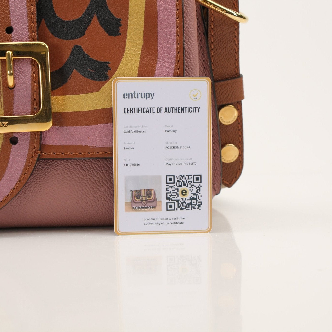 Gold & Beyond Burberry Buckle Crossbody Bag, stylish handbag with buckle detail and adjustable strap, designer accessory.
