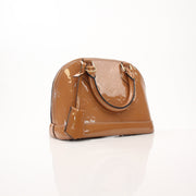 Louis Vuitton Rose Vernis Alma BB handbag with gold hardware and structured design, featuring the signature glossy finish and elegant shape.