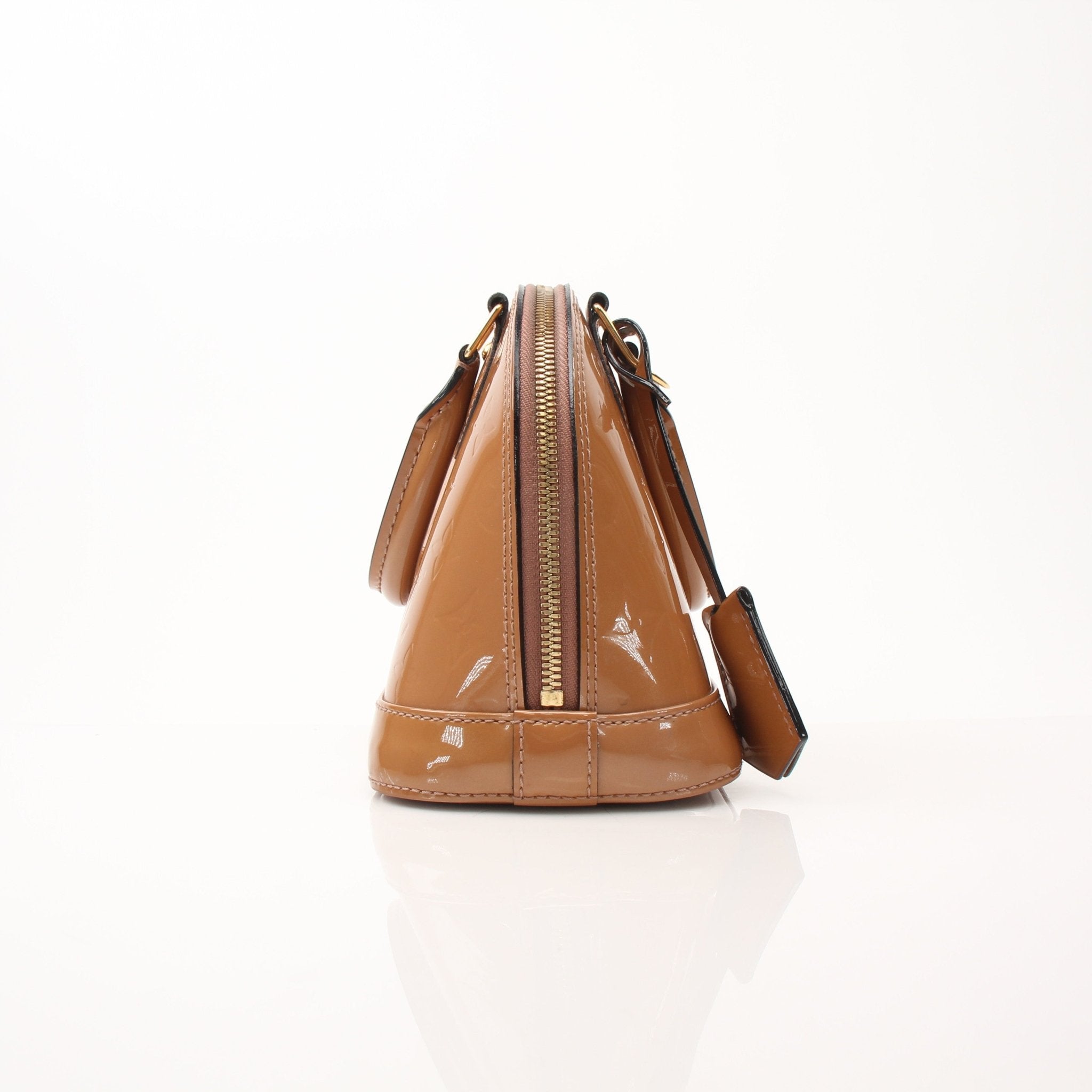 Louis Vuitton Rose Vernis Alma BB handbag in pink with gold-tone hardware, featuring structured shape and top handles.