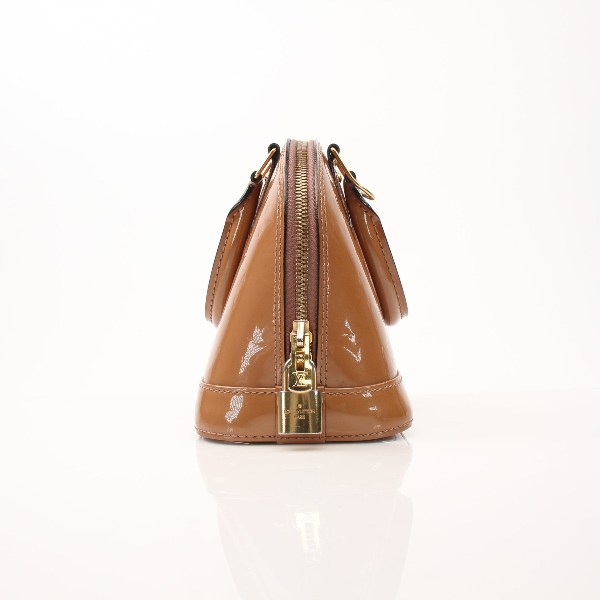 Louis Vuitton Rose Vernis Alma BB handbag with gold hardware, elegant small leather purse, shiny patent finish, side view.