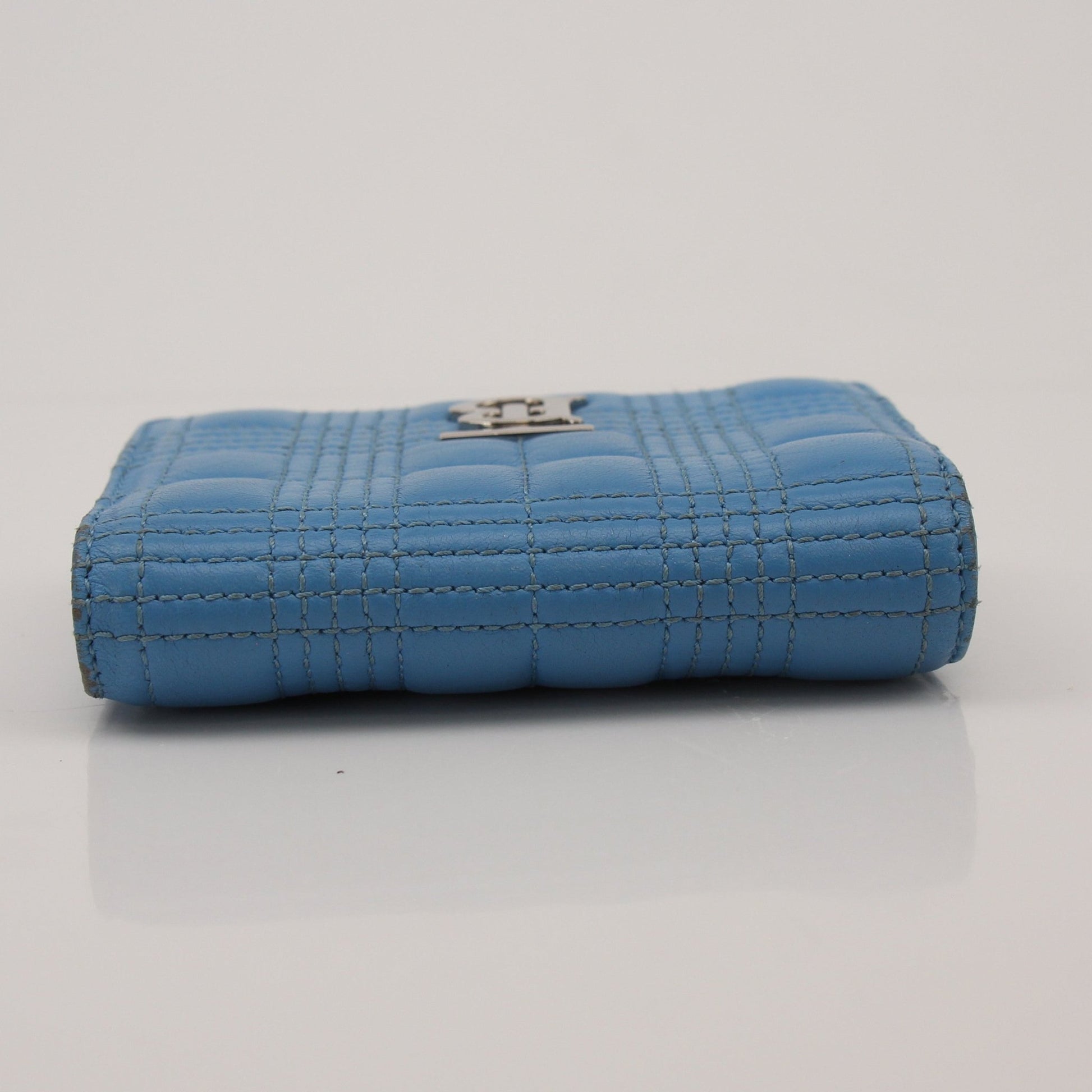 Gold & Beyond Burberry Lola Wallet with signature check pattern and gold-toned hardware, open to show multiple card slots and compartments.