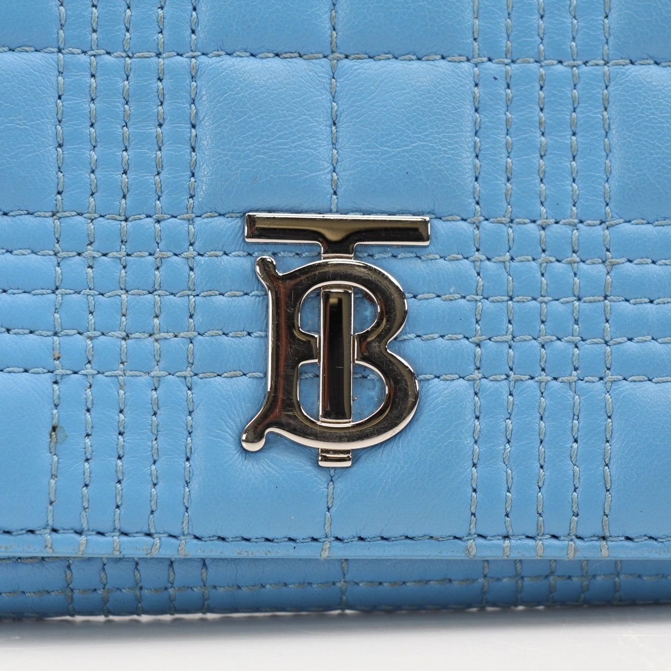 Gold & Beyond Burberry Lola Wallet showing its sleek design, wallet exterior with logo, and multiple card slots.