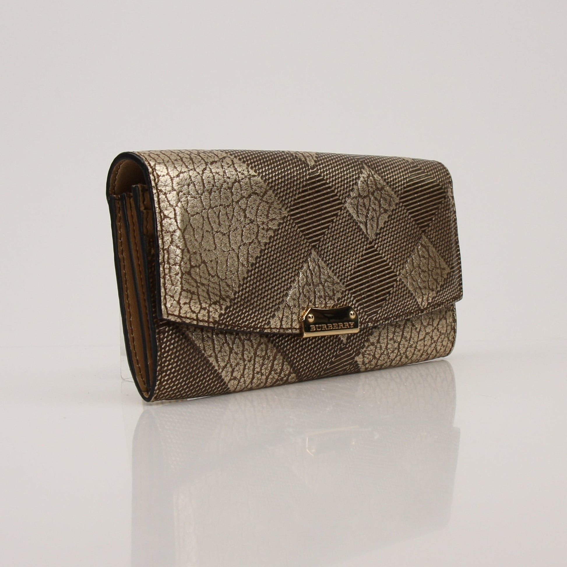Gold & Beyond Burberry Continental Wallet open, showing multiple card slots and cash compartments in classic check pattern.