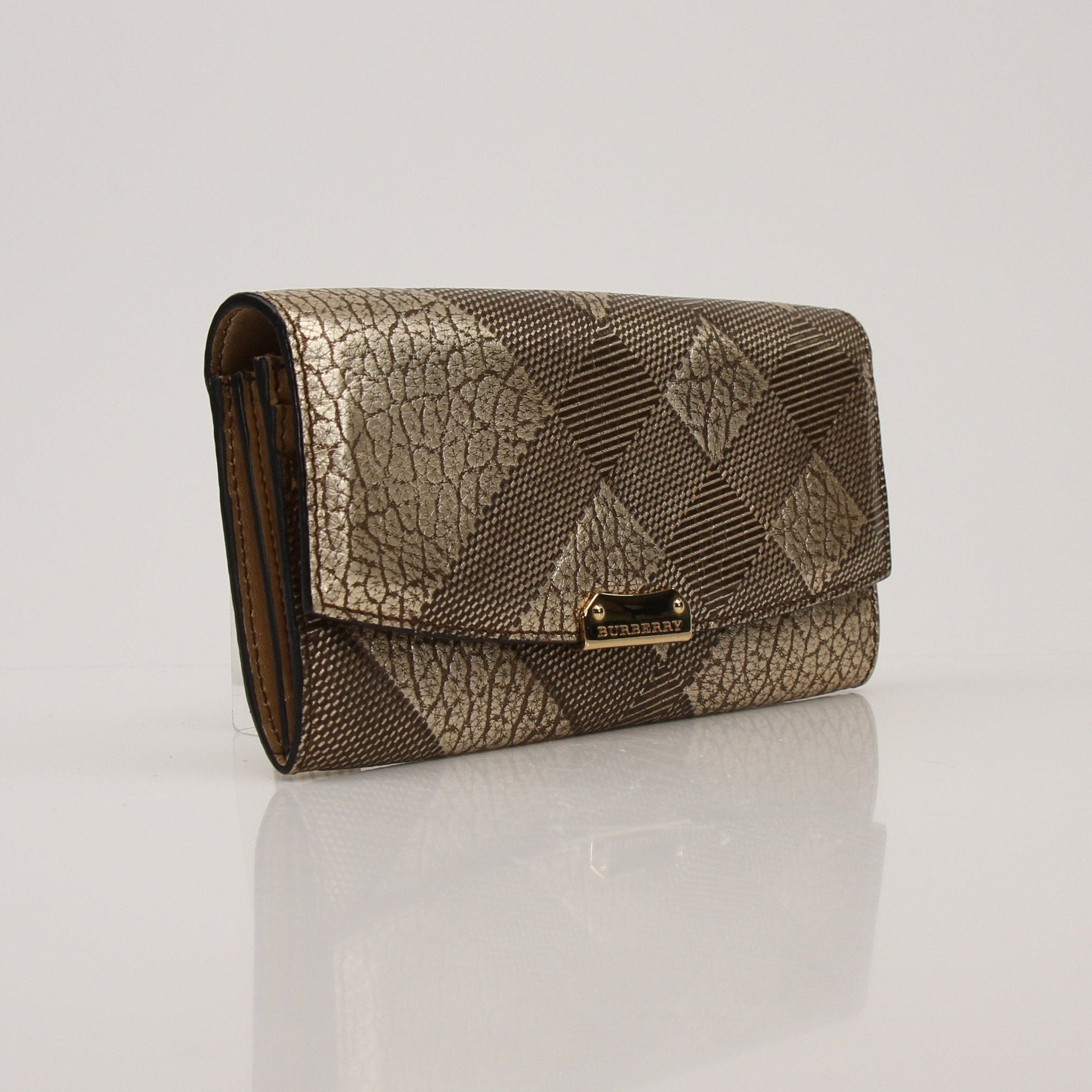 Gold & Beyond Burberry Continental Wallet open, showing multiple card slots and cash compartments in classic check pattern.