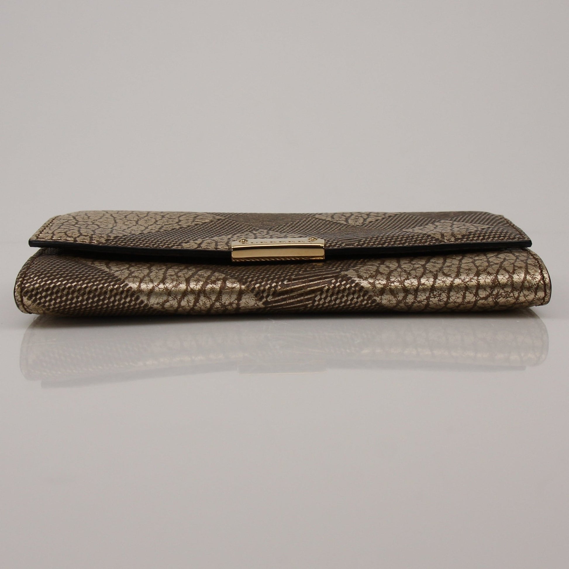 Gold & Beyond Burberry Continental Wallet showing the branded leather exterior and organized interior compartments.
