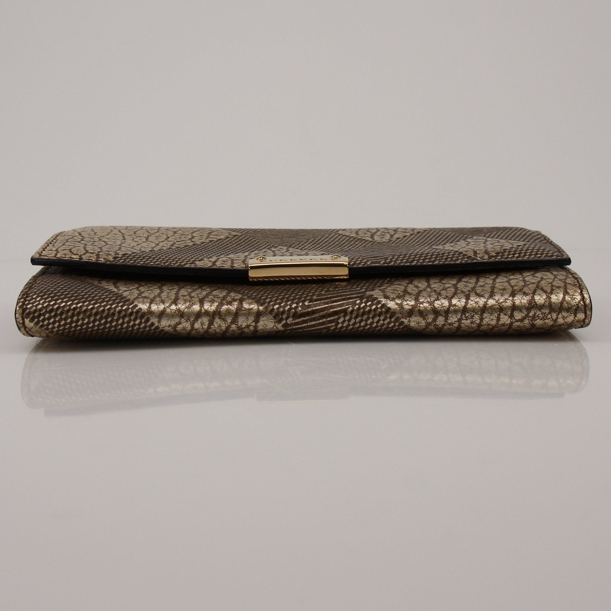 Gold & Beyond Burberry Continental Wallet showing the branded leather exterior and organized interior compartments.