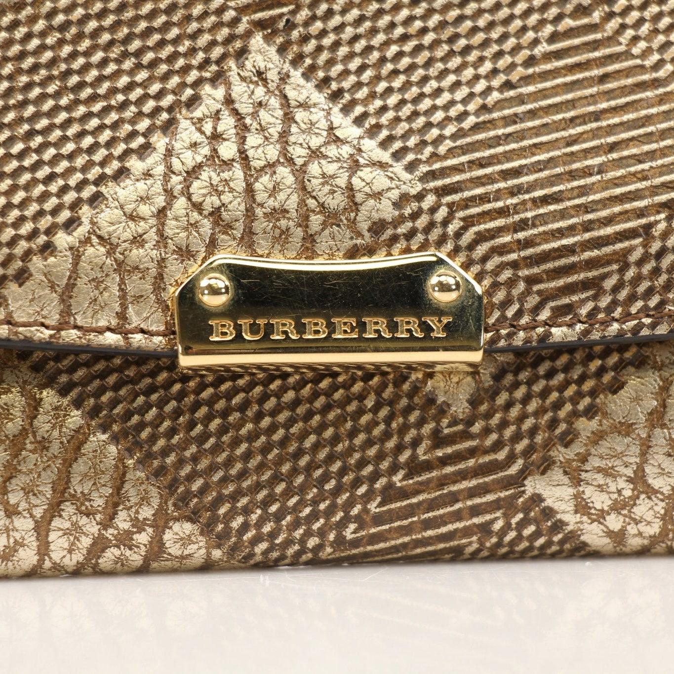 Gold & Beyond Burberry Continental Wallet with multiple card slots and signature check pattern leather on a white background.