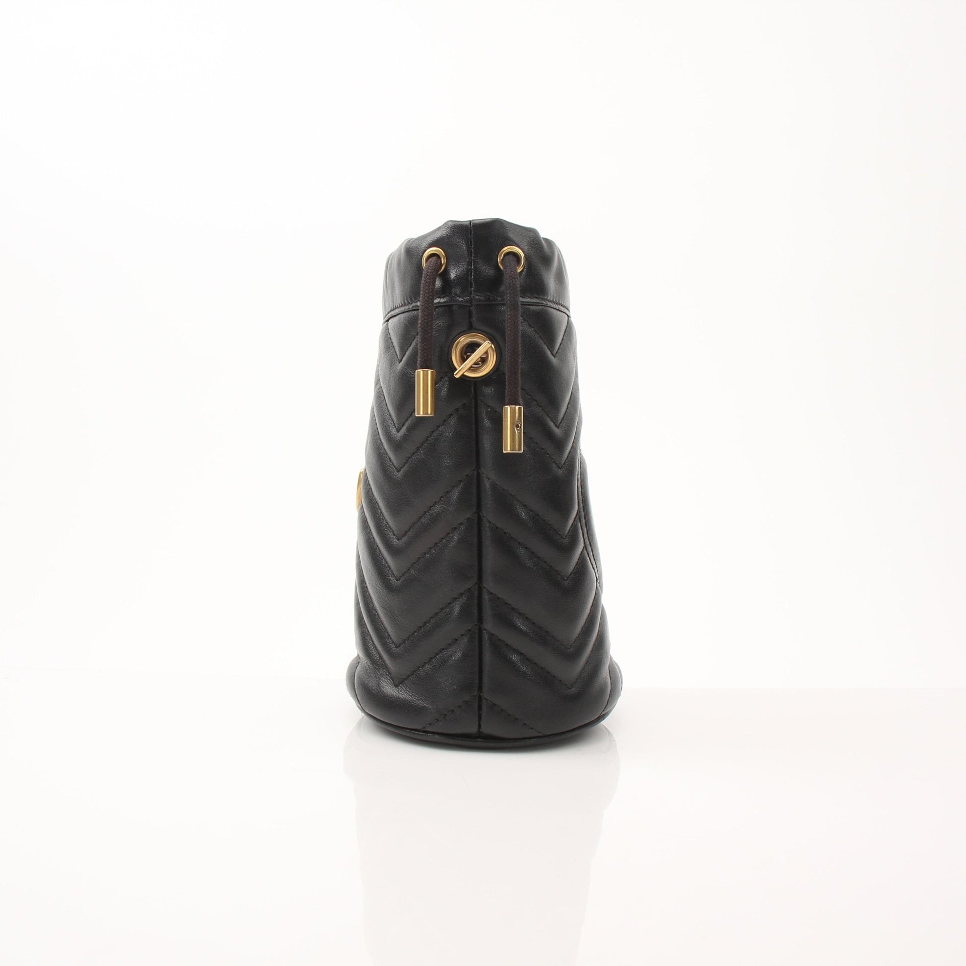 Gold & Beyond Gucci GG Marmont small bucket handbag with chain strap and chevron quilted leather design.