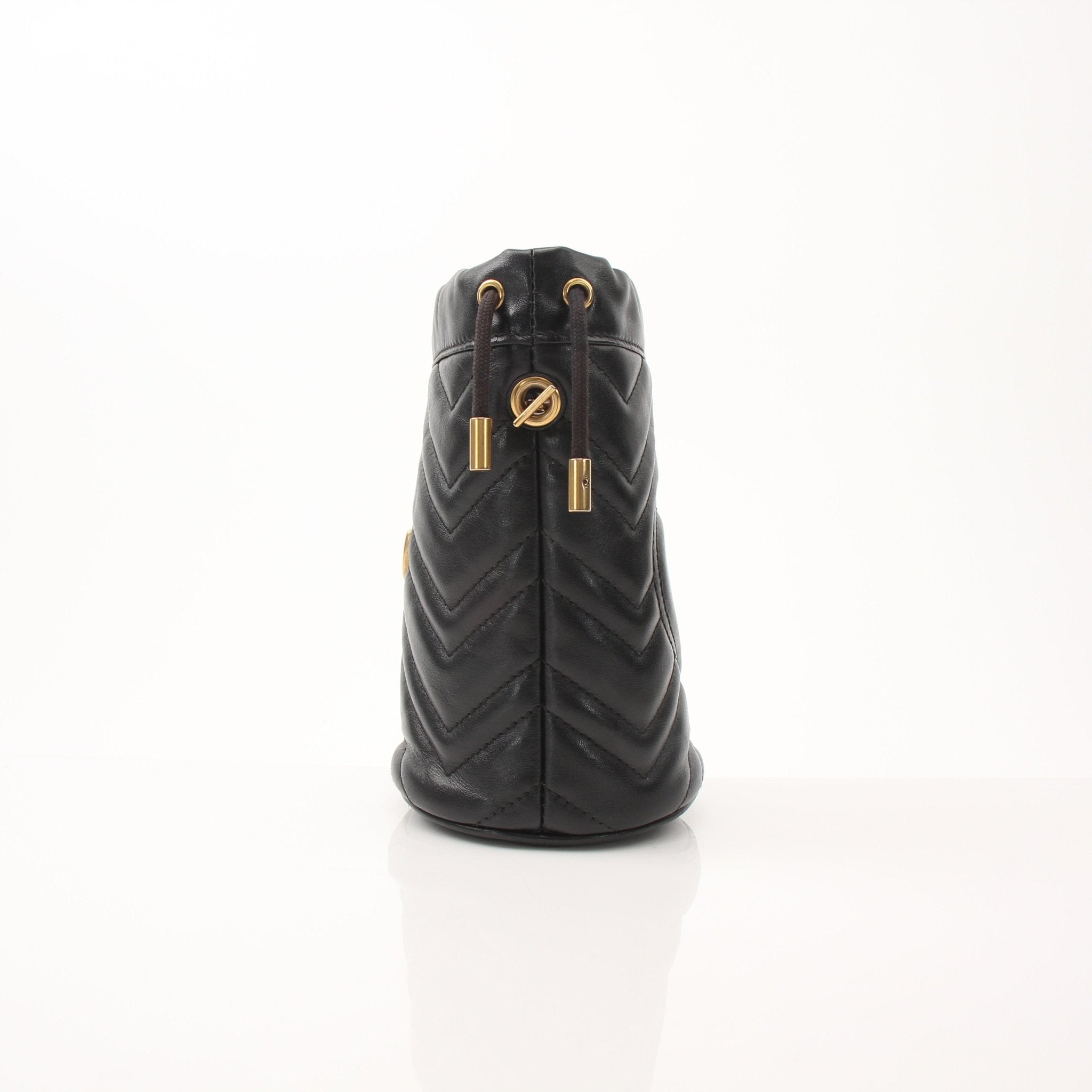 Gold & Beyond Gucci GG Marmont small bucket handbag with chain strap and chevron quilted leather design.