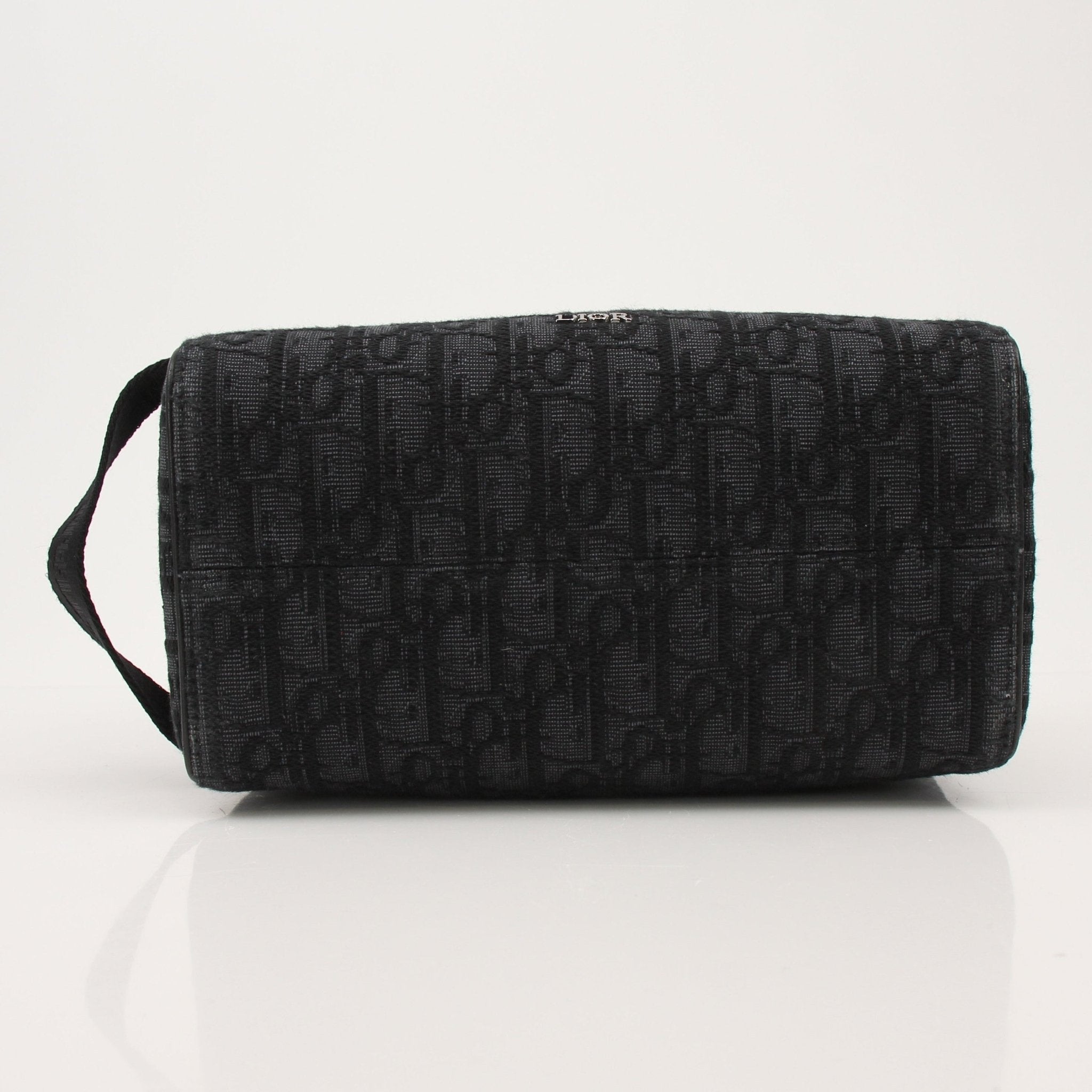 Gold & Beyond Christian Dior Dior Oblique toiletry bag, stylish handbag with signature Dior print and compact design.