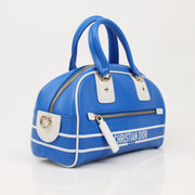 Christian Dior blue bowling handbag with gold accents, stylish and spacious designer hand-held bag displayed against a neutral background.