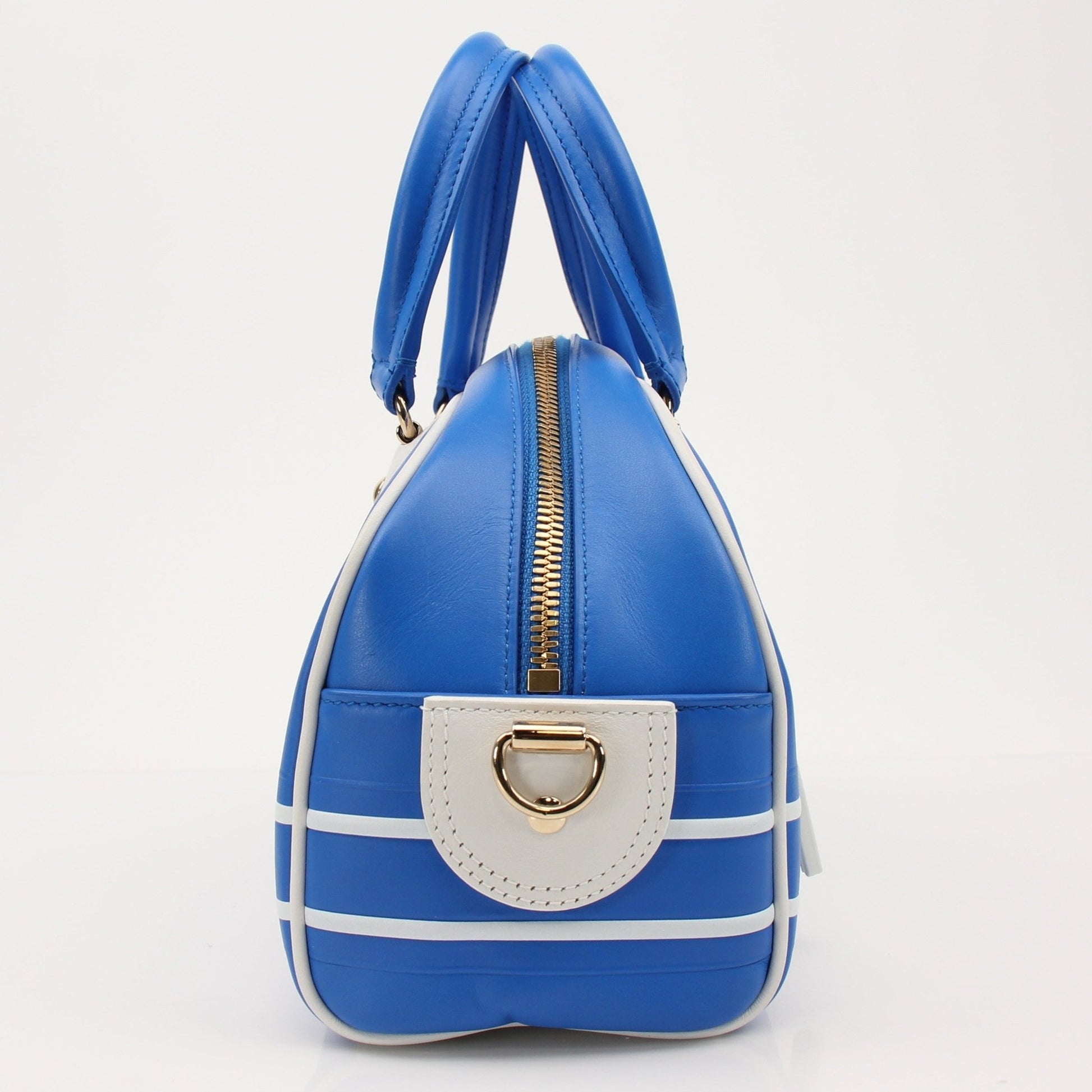 Christian Dior blue bowling handbag with gold accents, stylish leather tote with structured shape and top handle.